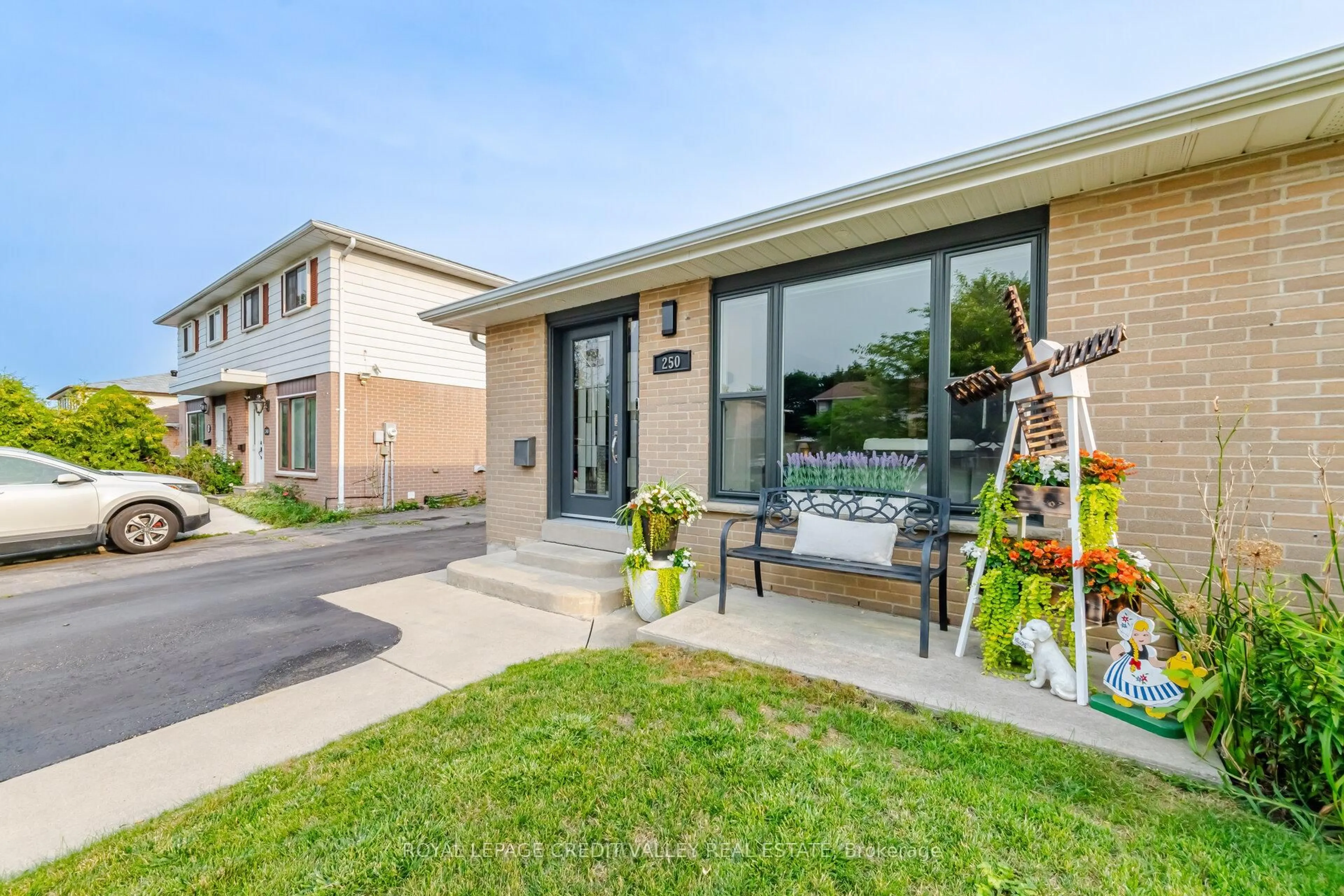 Home with brick exterior material, street for 250 Archdekin Dr, Brampton Ontario L6V 1Z2