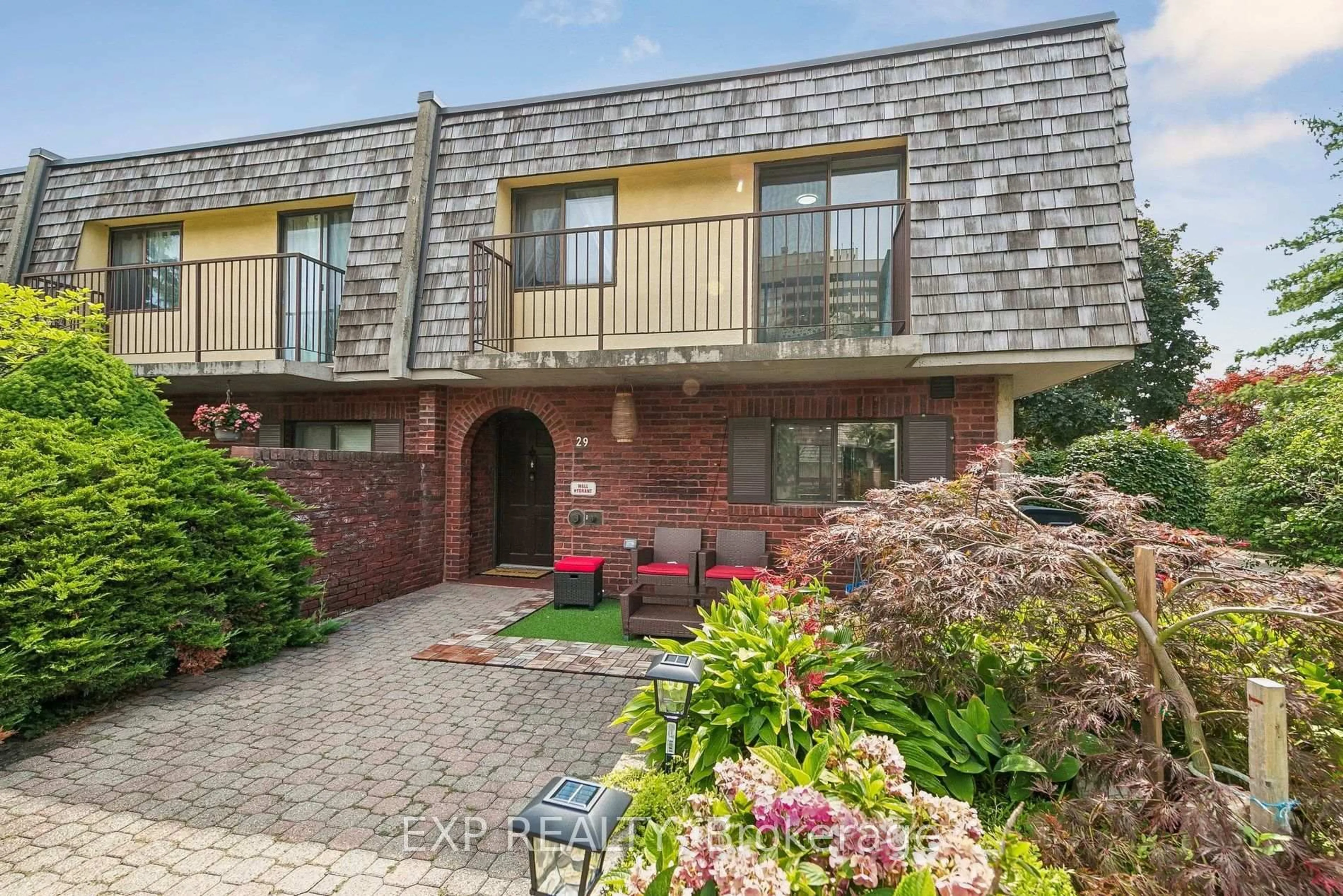 Home with brick exterior material, street for 1250 Mississauga Valley Blvd #29, Mississauga Ontario L5A 3R6