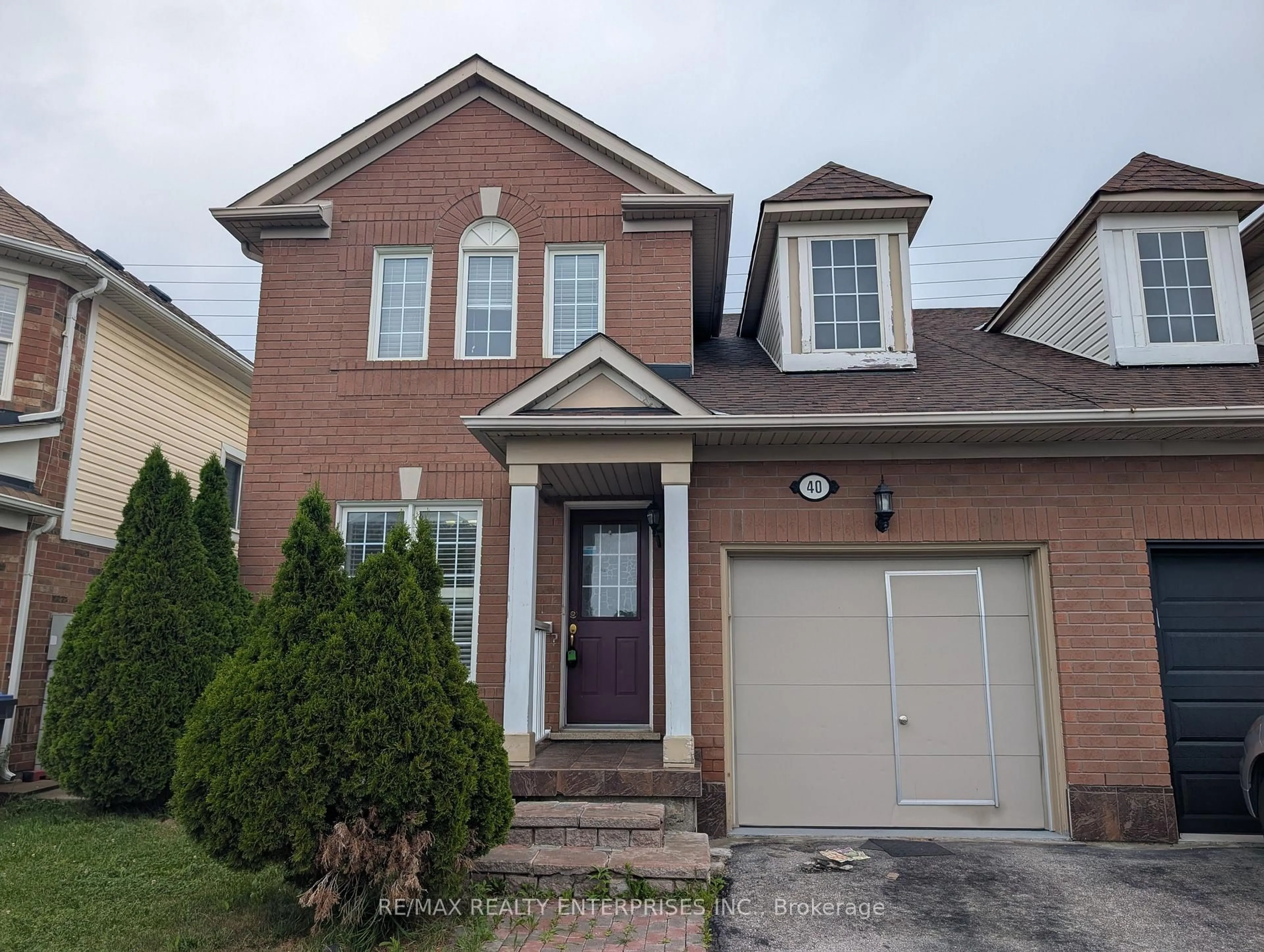 Home with brick exterior material, street for 40 Sweetwood Circ, Brampton Ontario L7A 2X7
