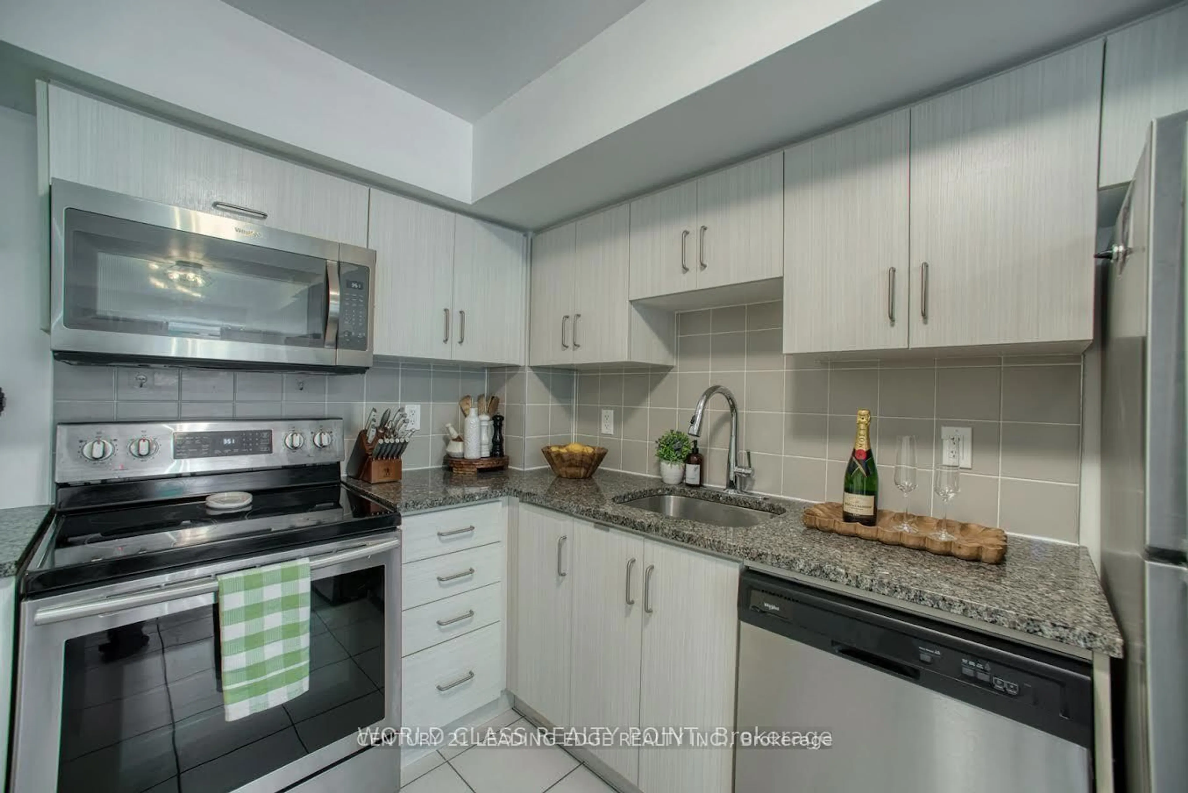 Standard kitchen, ceramic/tile floor for 7 Applewood Lane #221, Toronto Ontario M9C 0C1