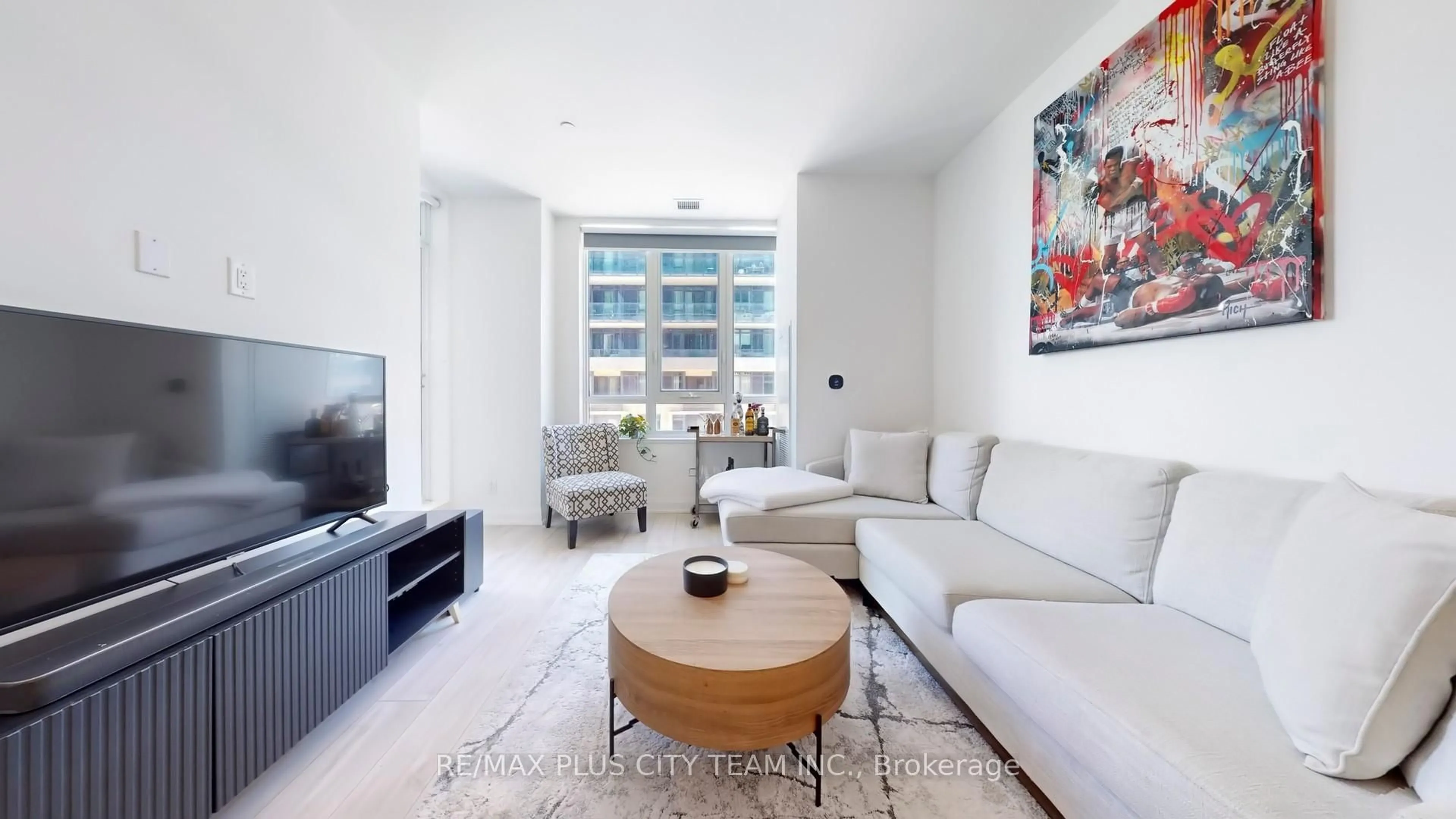 Living room with furniture, unknown for 70 Annie Craig Dr #205, Toronto Ontario M8V 0G2