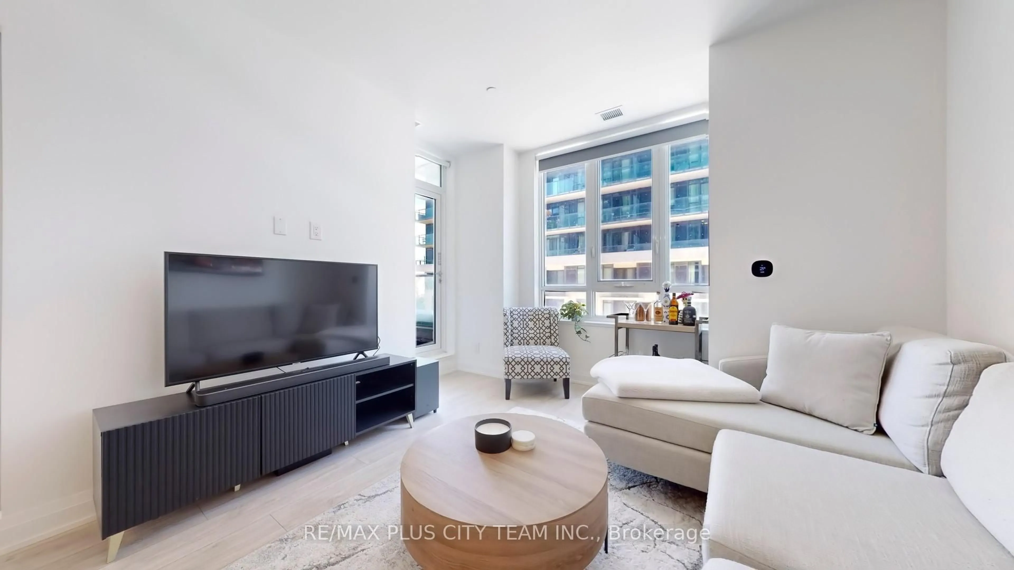 Living room with furniture, unknown for 70 Annie Craig Dr #205, Toronto Ontario M8V 0G2