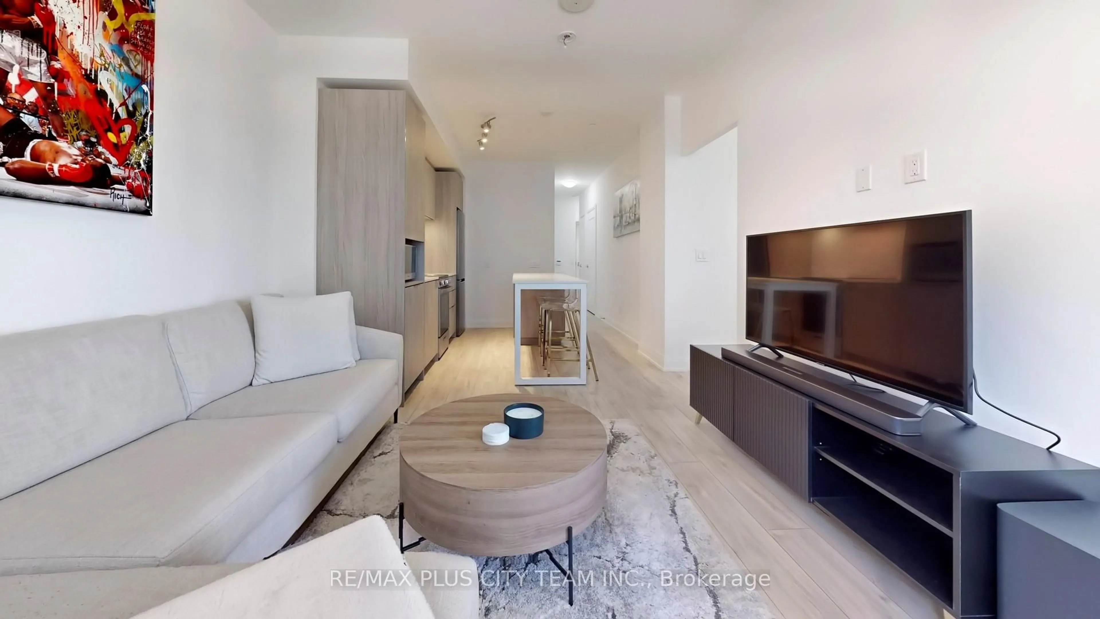 Living room with furniture, unknown for 70 Annie Craig Dr #205, Toronto Ontario M8V 0G2