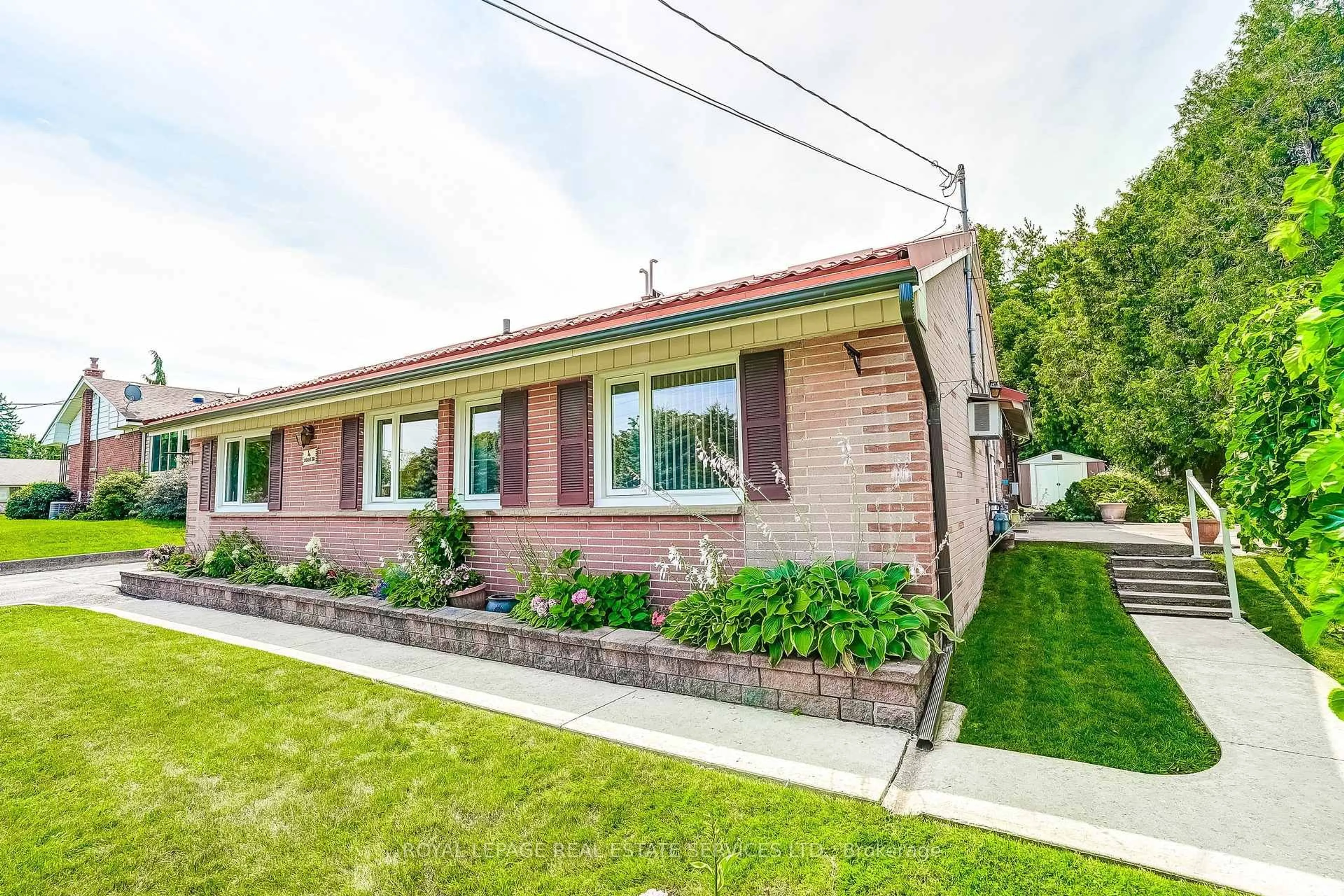 Home with brick exterior material, street for 4 Sora Dr, Mississauga Ontario L5M 1A8