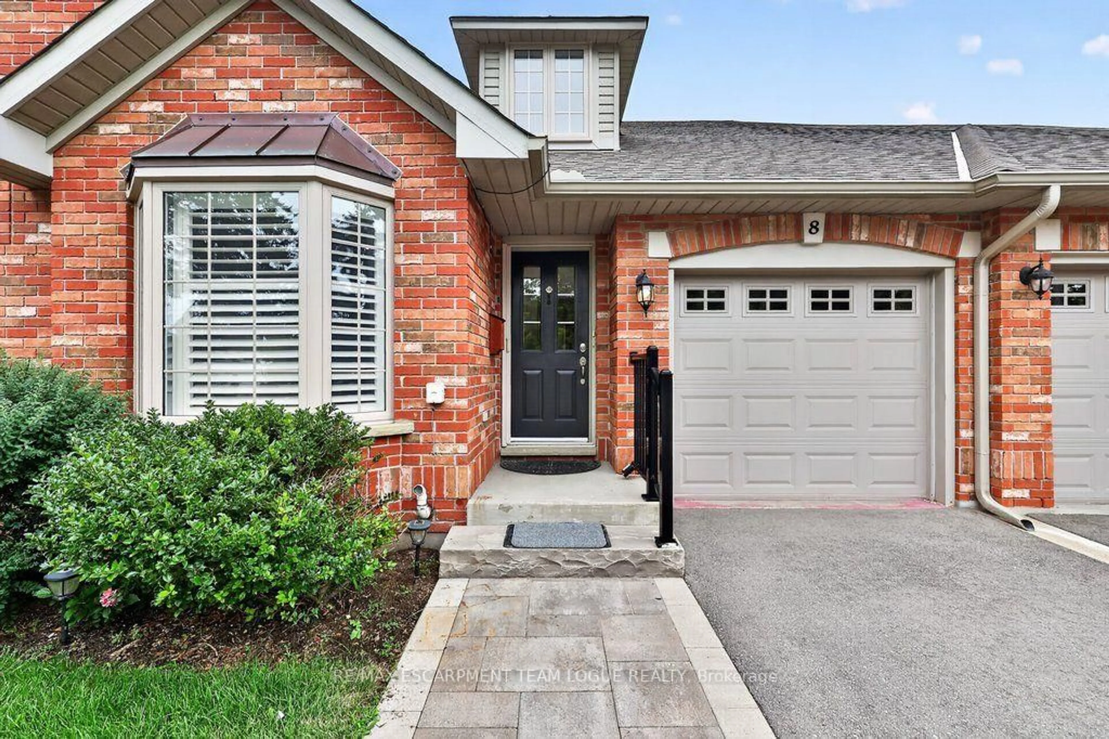 Home with brick exterior material, street for 767 Maple Ave #8, Burlington Ontario L7S 2K1