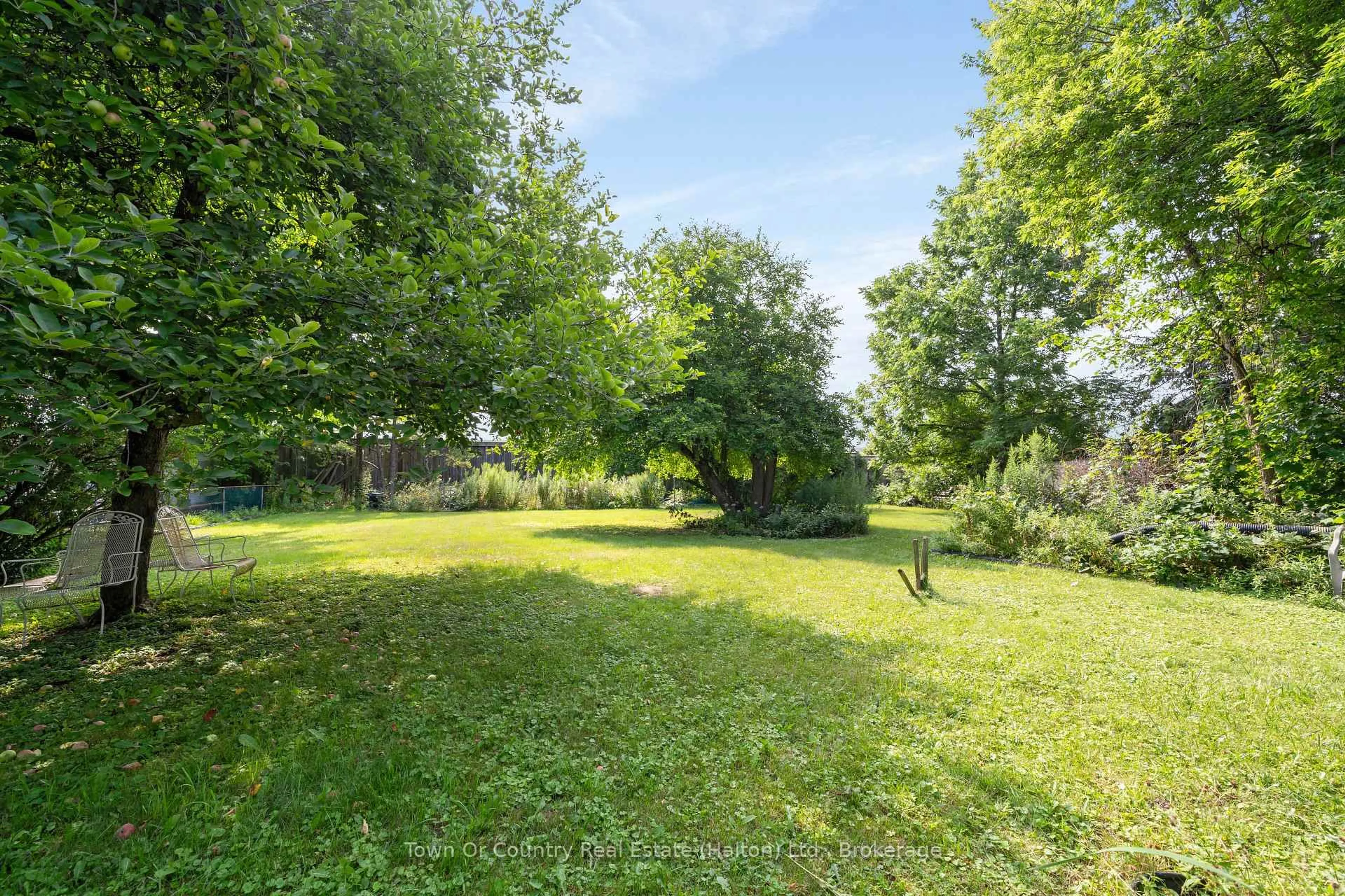 A pic from outside/outdoor area/front of a property/back of a property/a pic from drone, forest/trees view for 7640 5 Sdrd, Milton Ontario L9T 2X7