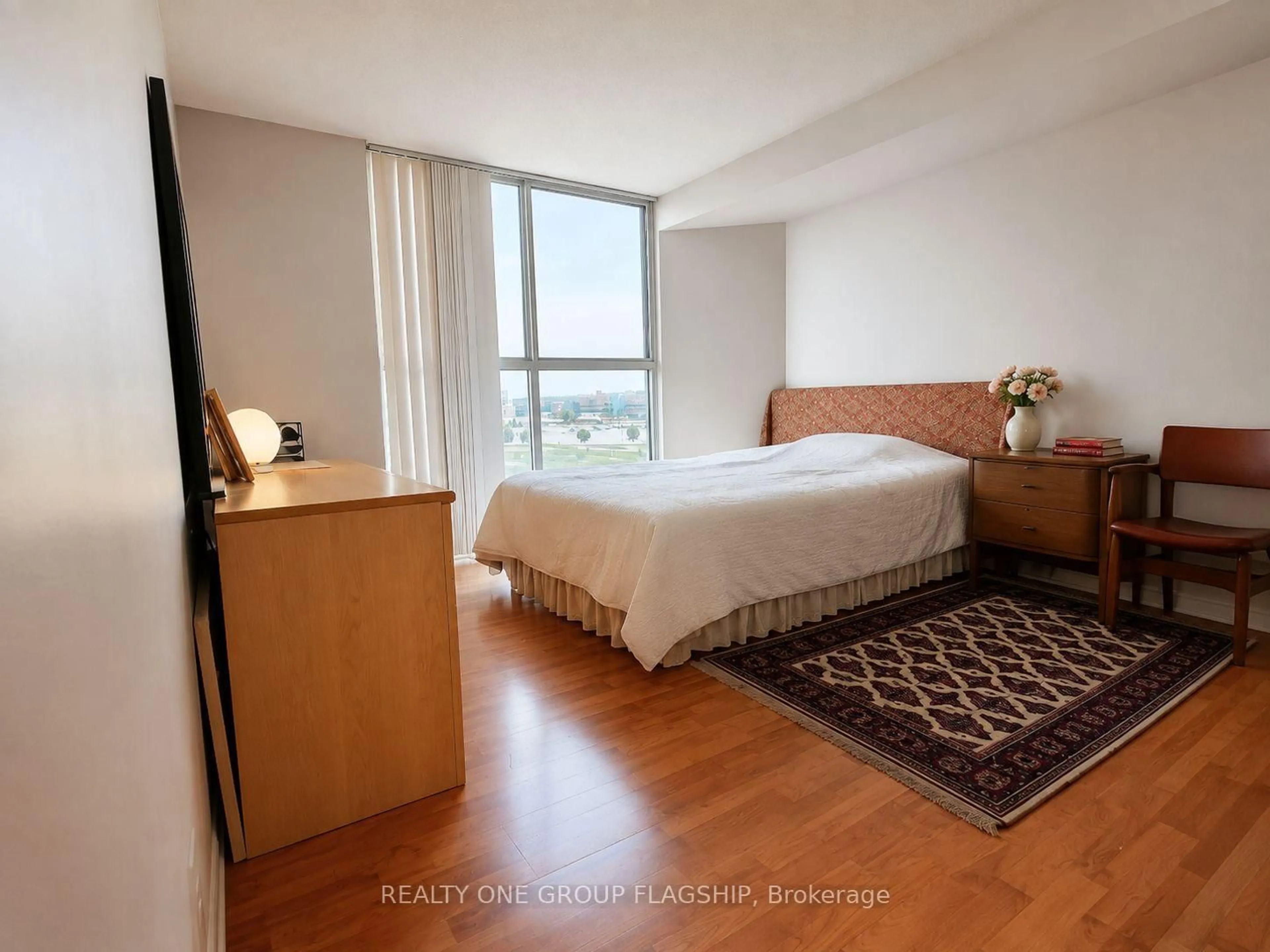 Bedroom with bed, wood/laminate floor for 600 Rexdale Blvd #802, Toronto Ontario M9W 6T4