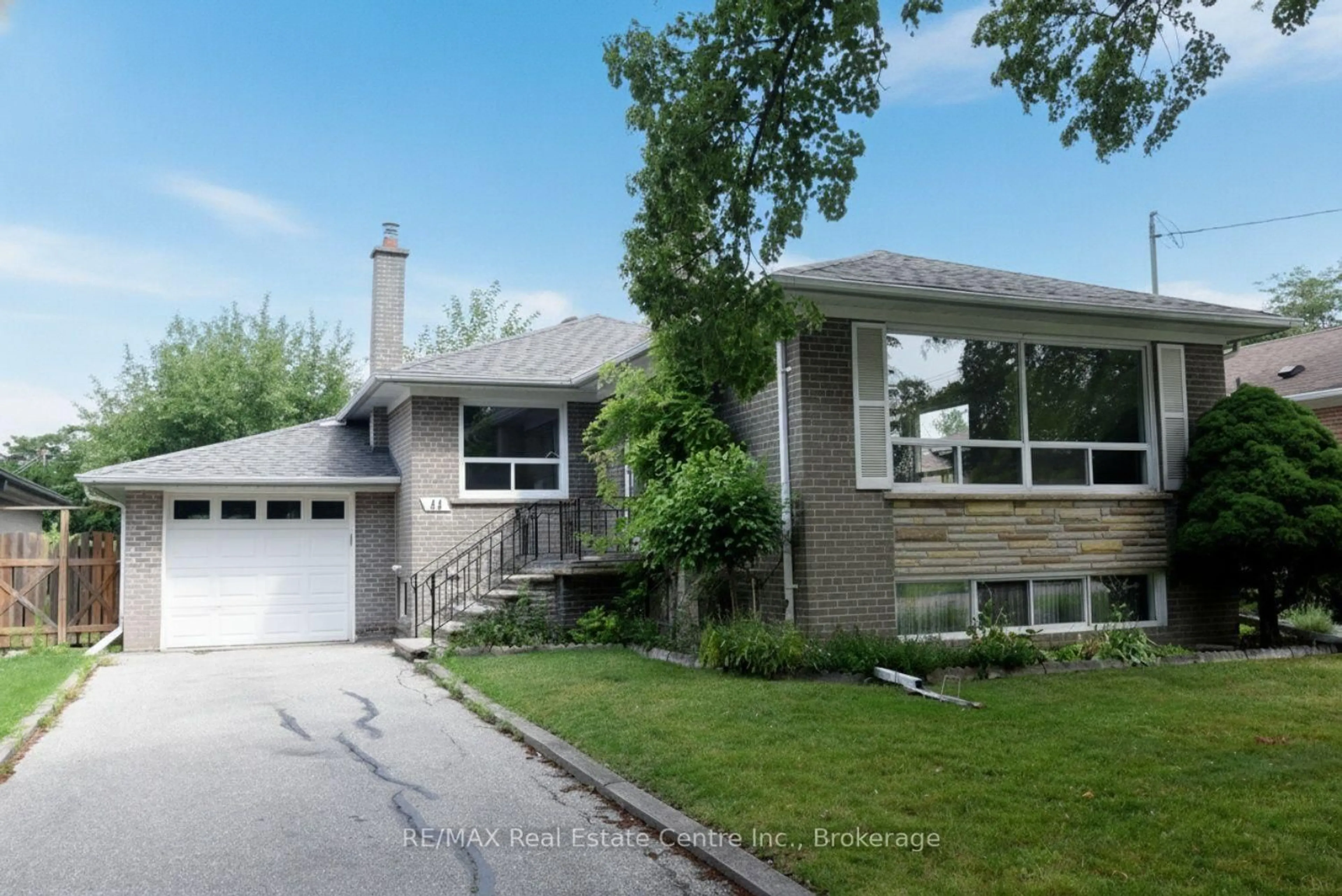 Home with vinyl exterior material, street for 44 Beckwith Rd, Toronto Ontario M9C 3Y1