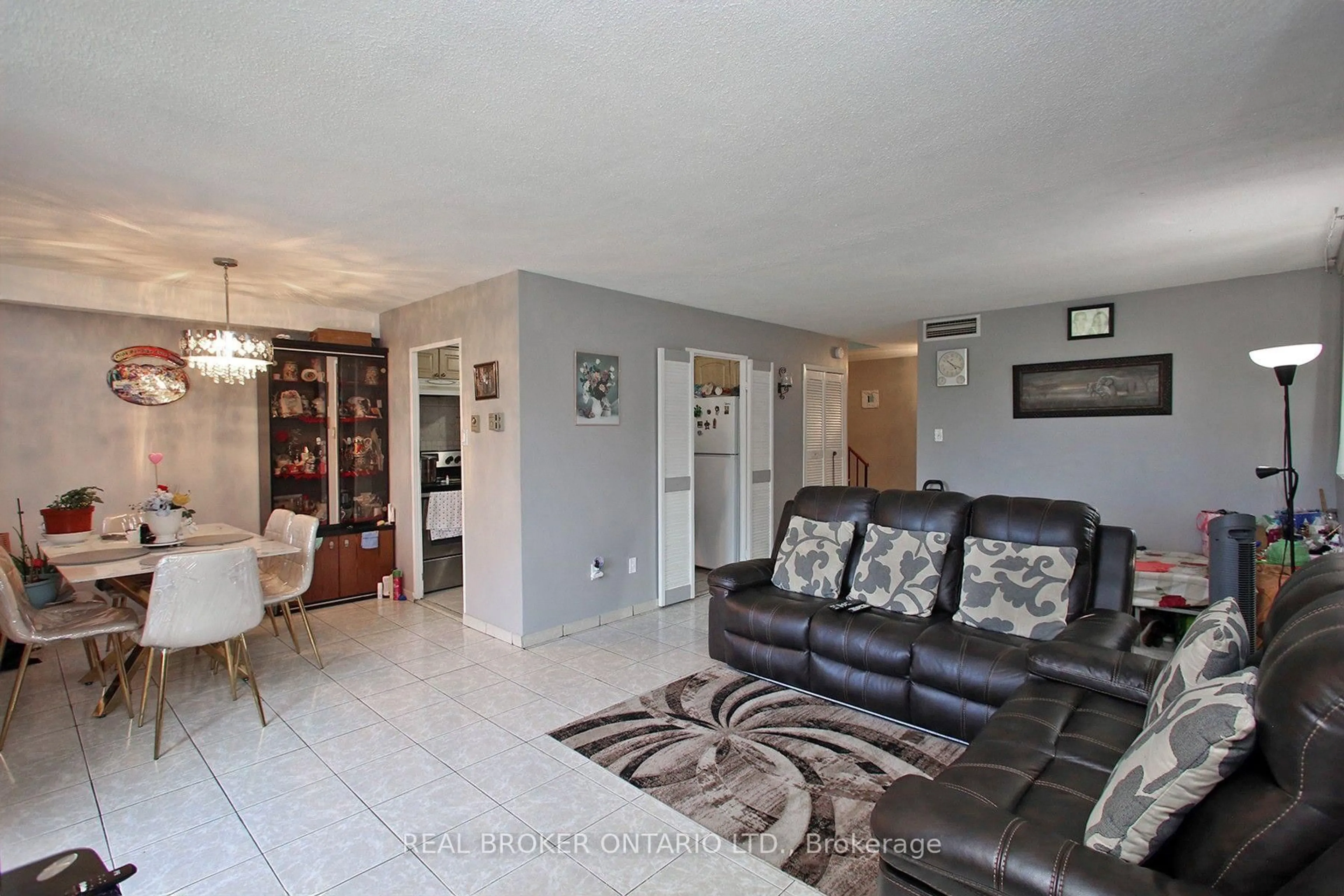 Living room with furniture, ceramic/tile floor for 2645 Jane St #312, Toronto Ontario M3L 2J3