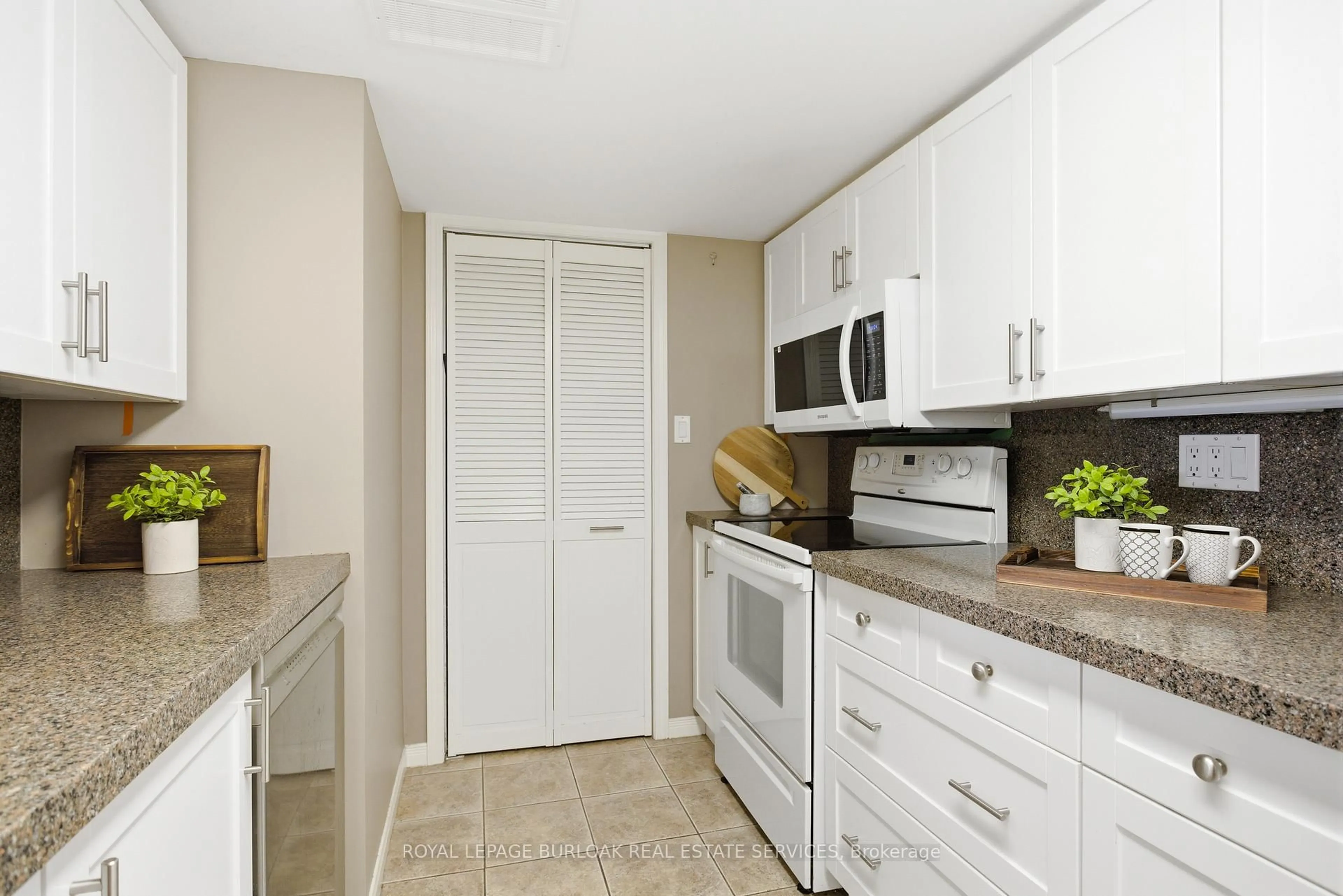 Standard kitchen, ceramic/tile floor for 216 Plains Rd #F304, Burlington Ontario L7T 4M1