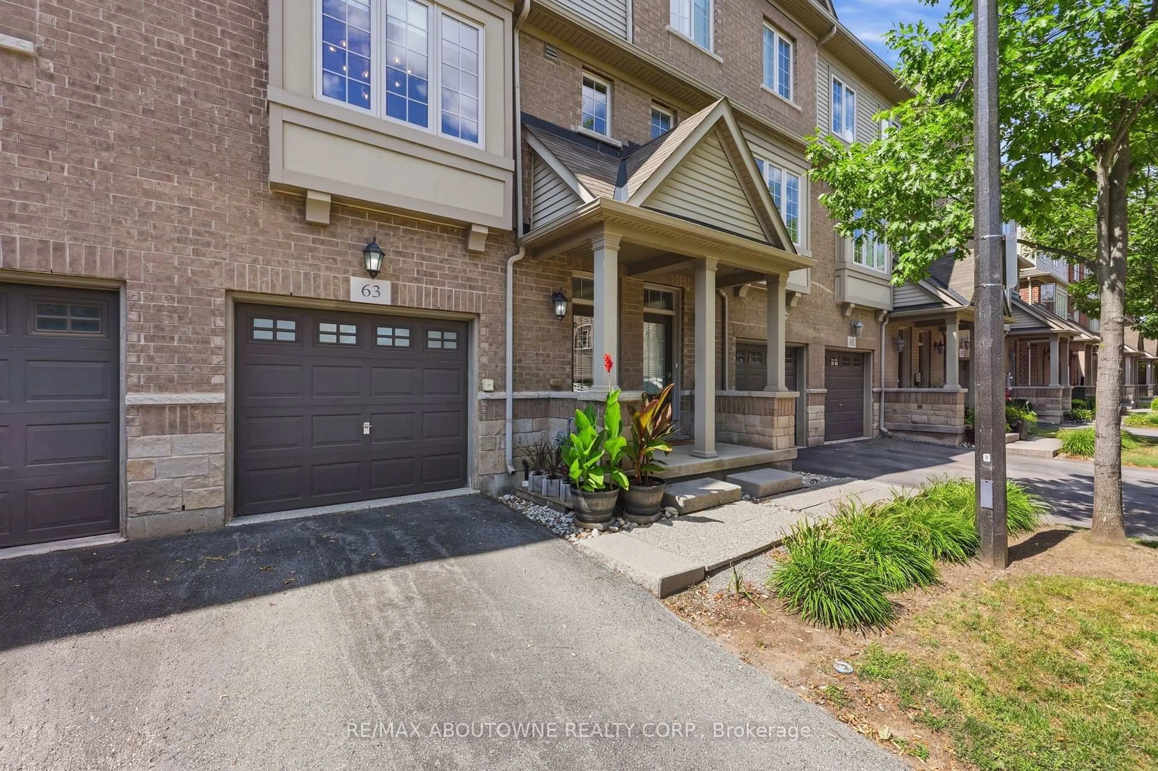 Home with brick exterior material, street for 1401 Plains Rd #63, Burlington Ontario L7R 0C2
