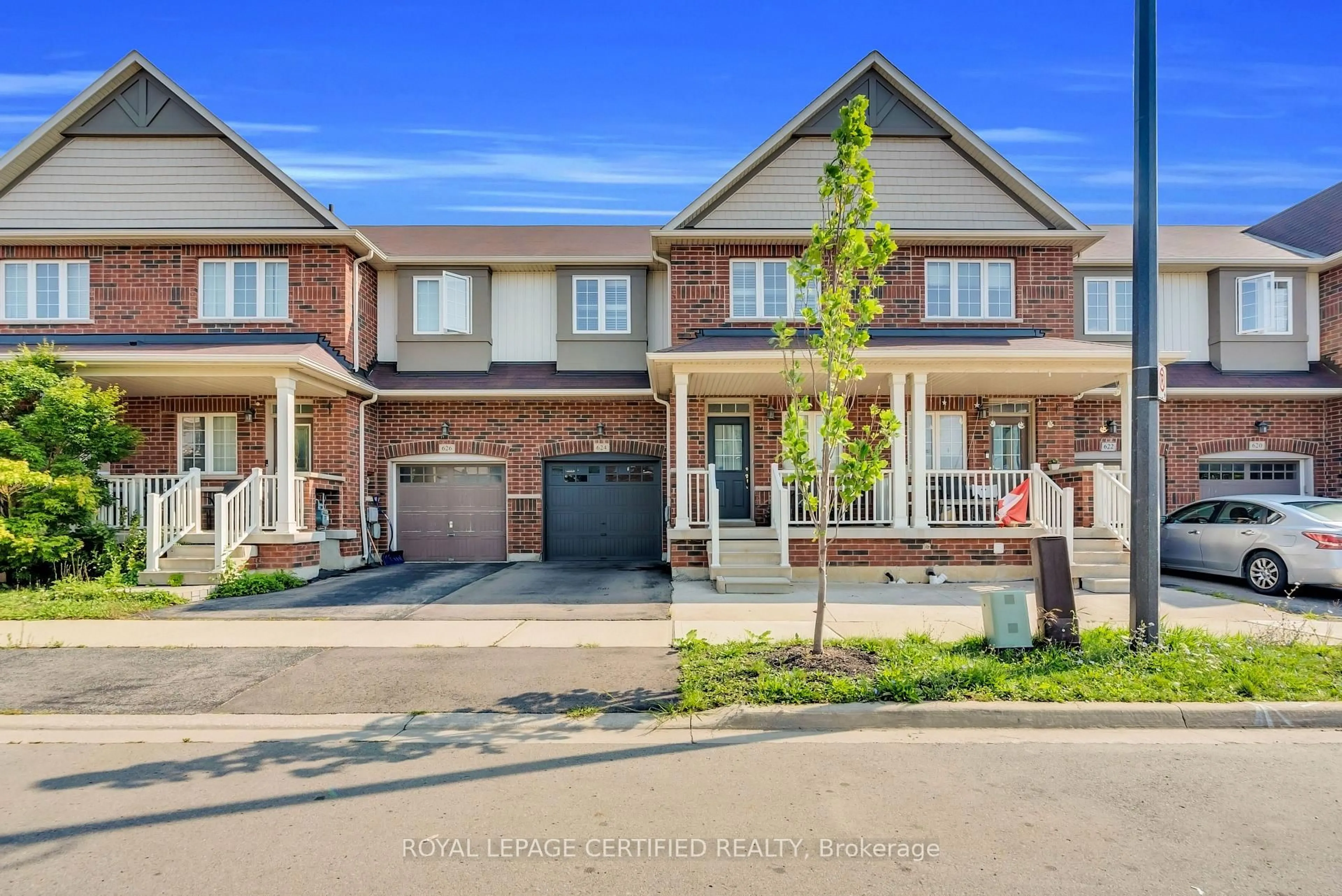 Home with brick exterior material, street for 624 Murray Meadows Pl, Milton Ontario L9T 8L7