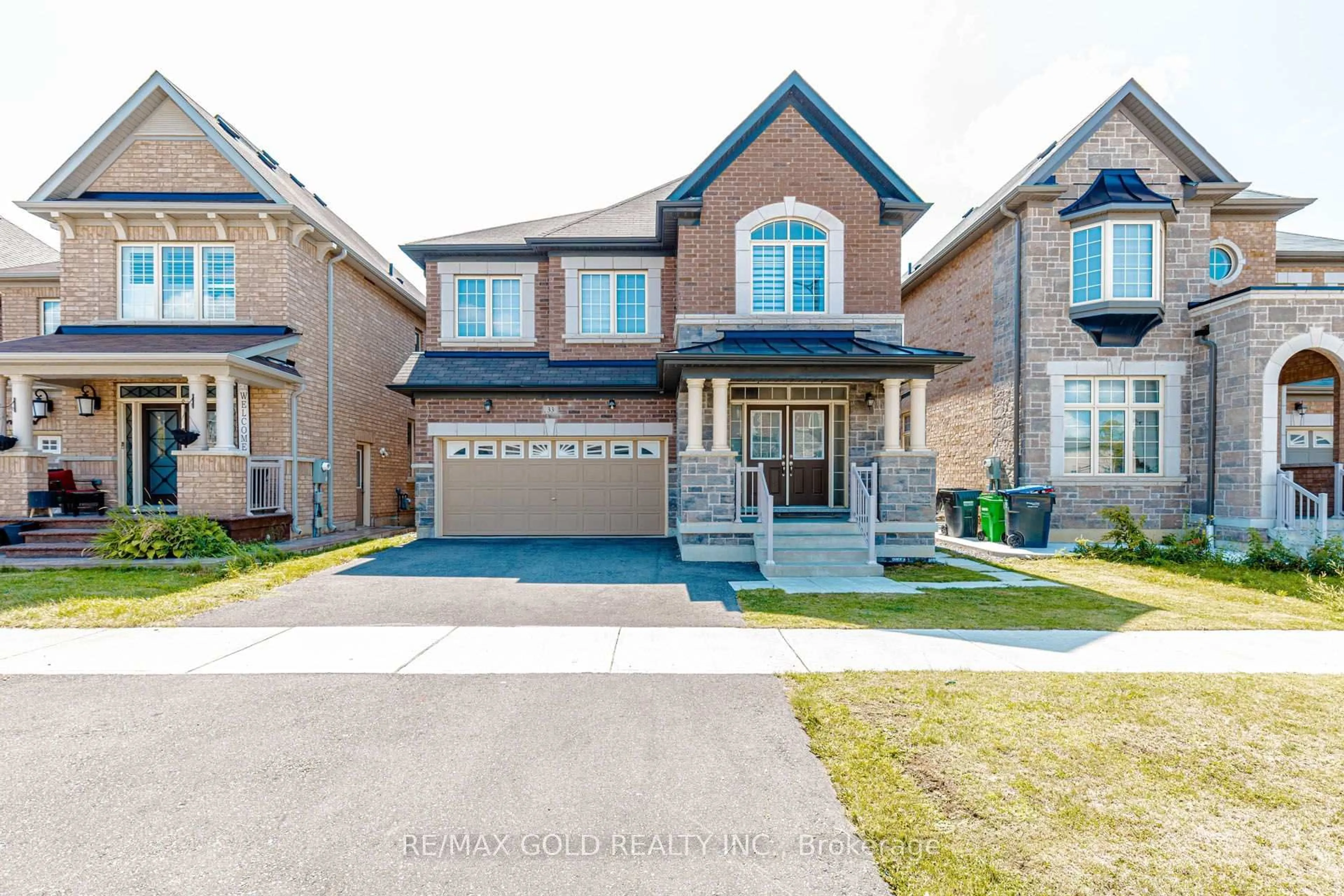 Home with brick exterior material, street for 33 Tiger Cres, Brampton Ontario L6R 0C8
