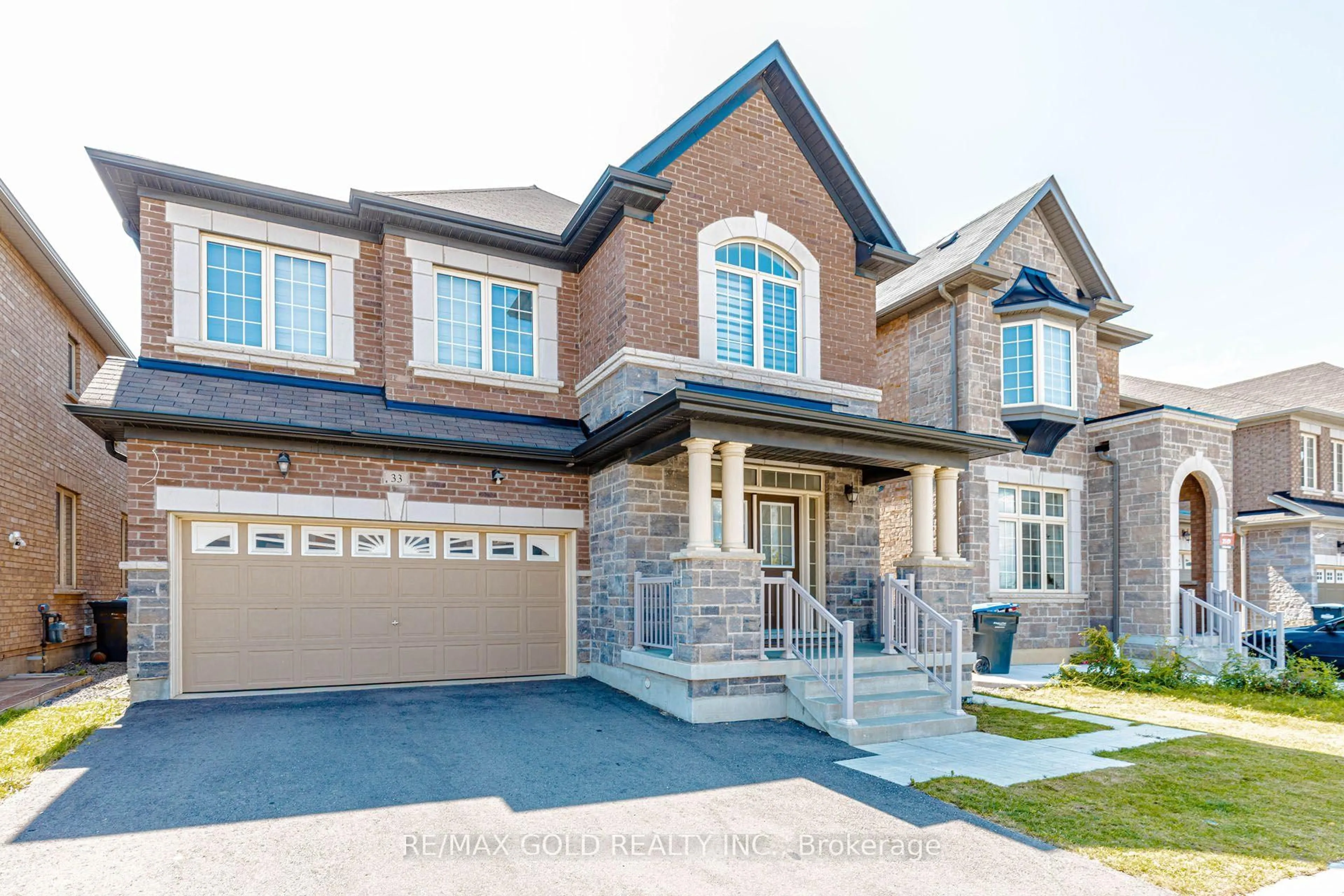 Home with brick exterior material, street for 33 Tiger Cres, Brampton Ontario L6R 0C8
