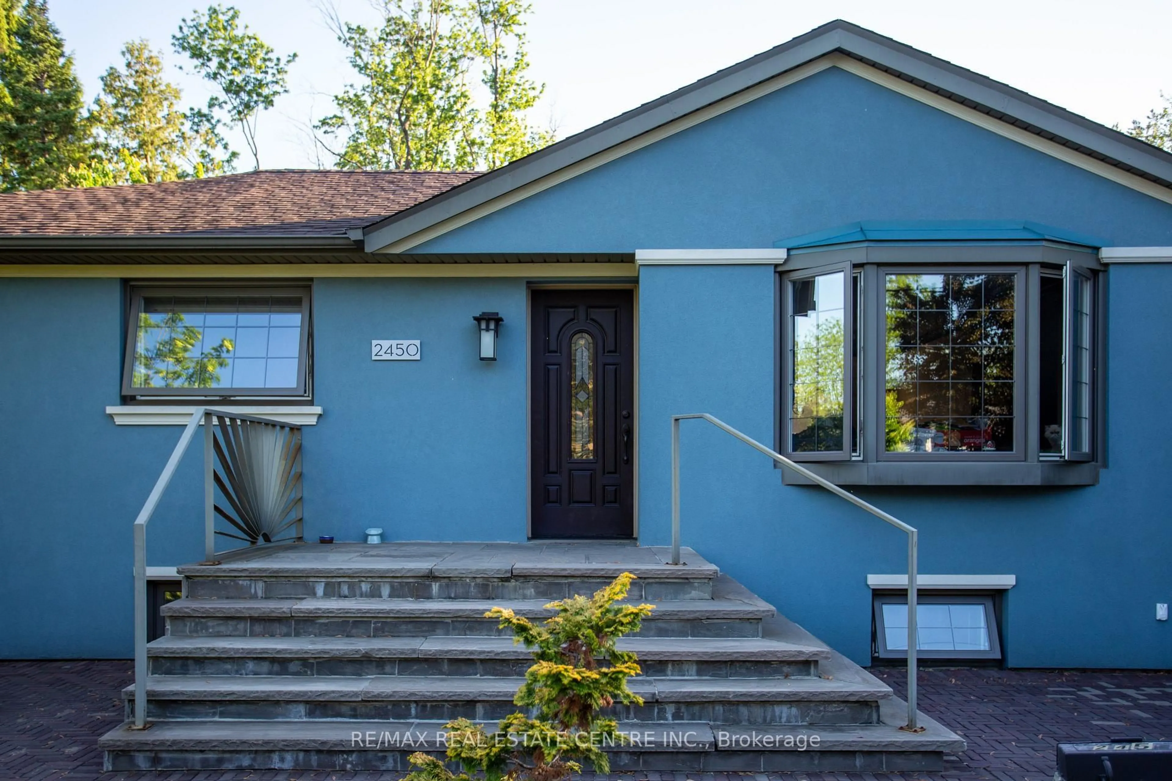 Home with vinyl exterior material, street for 2450 Edenhurst Dr, Mississauga Ontario L5A 2K9