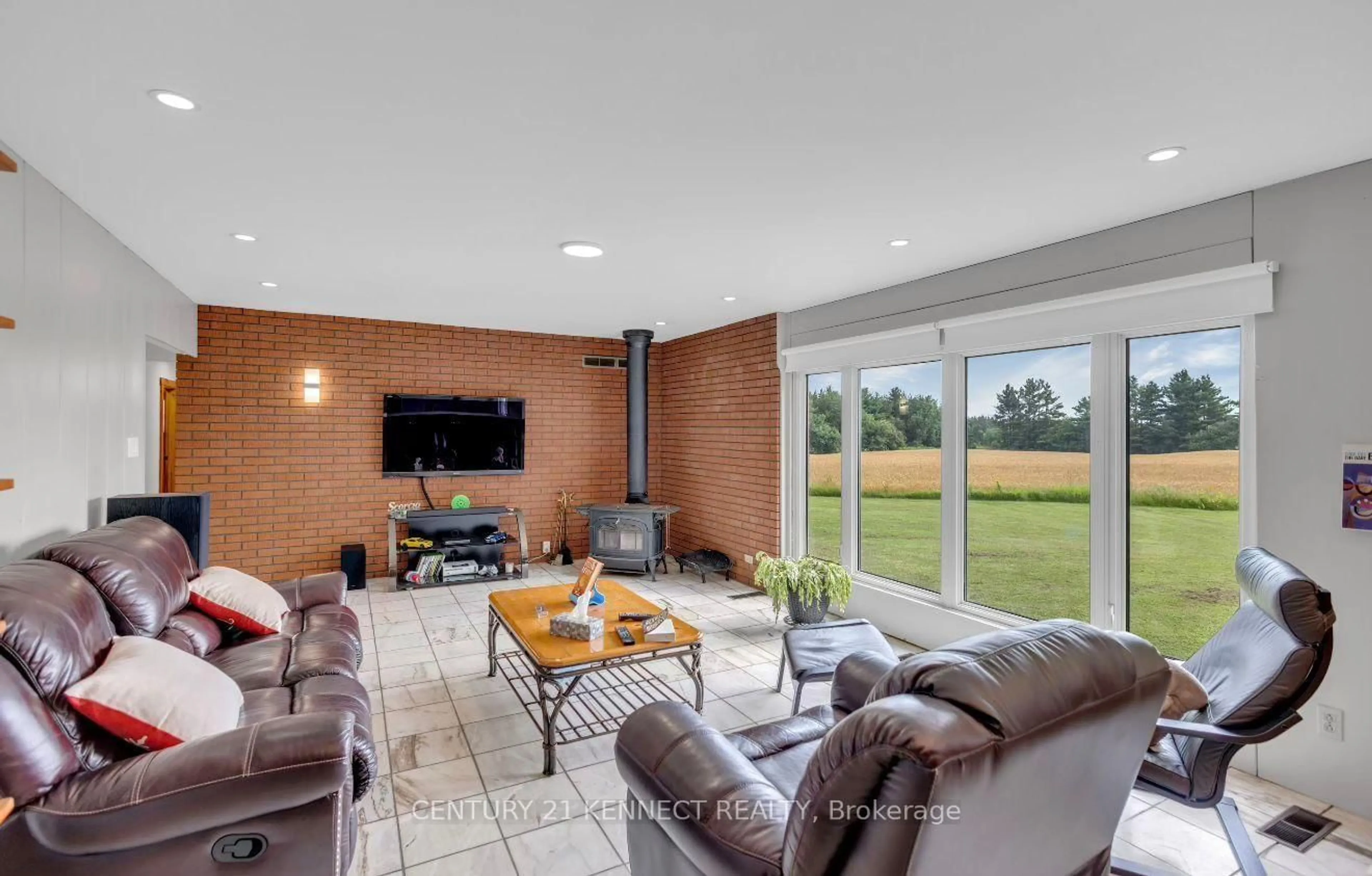 Living room with furniture, ceramic/tile floor for 14146 Crewsons Line, Milton Ontario L0P 1H0