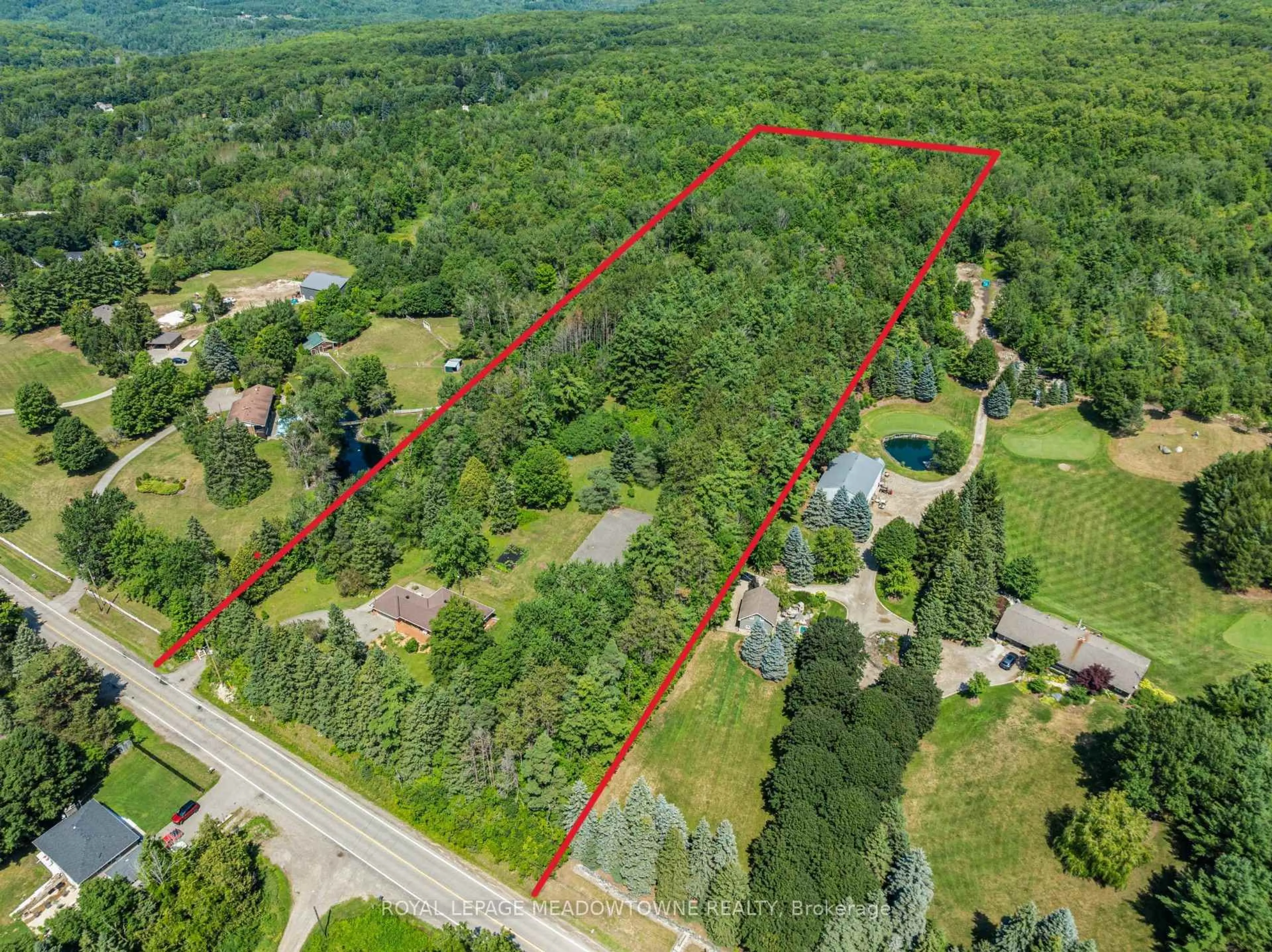 A pic from outside/outdoor area/front of a property/back of a property/a pic from drone, forest/trees view for 16703 Mississauga Rd, Caledon Ontario L7K 1M8