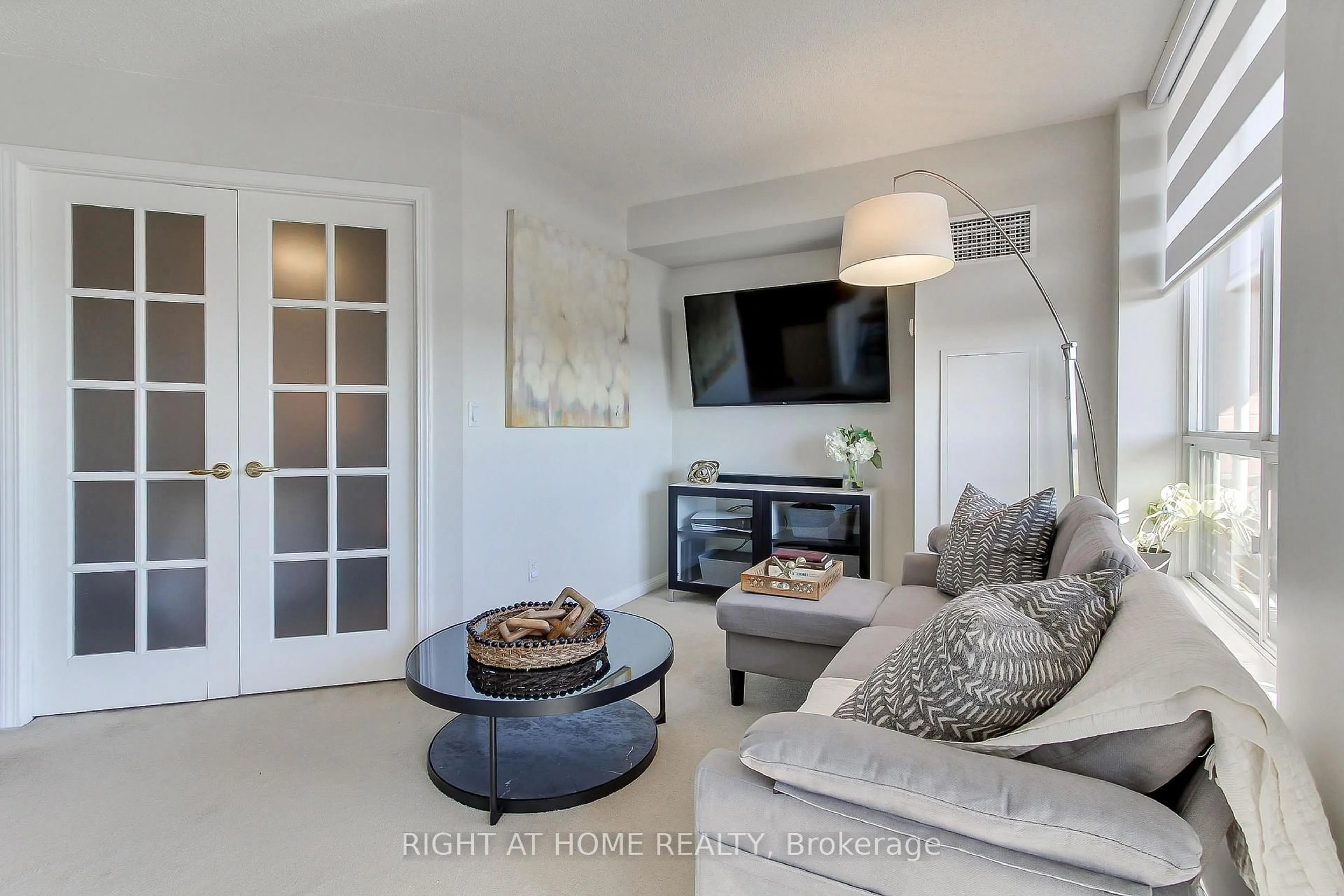 Living room with furniture, unknown for 1140 Parkwest Pl #1002, Mississauga Ontario L5E 3K9