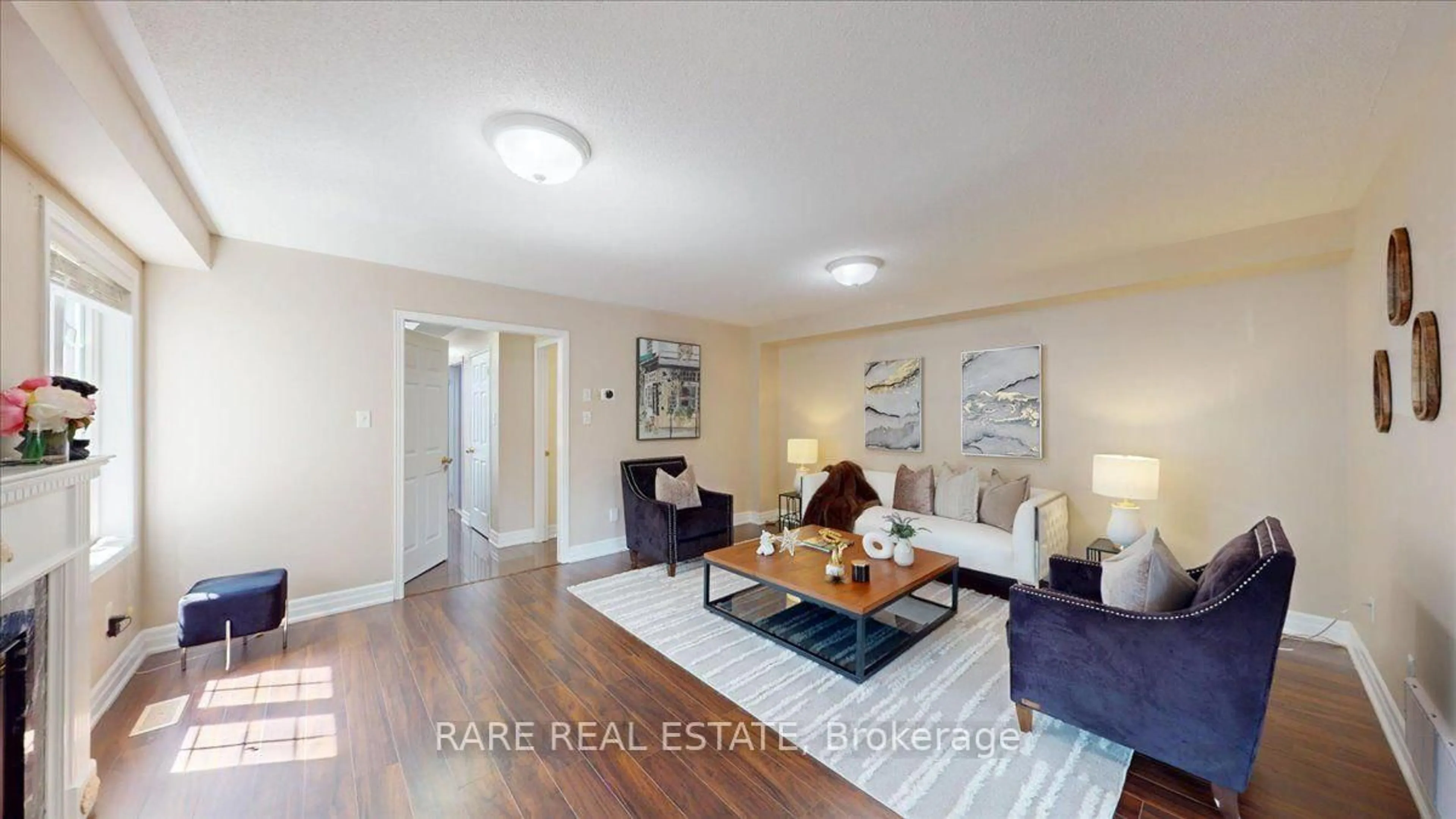 Living room with furniture, wood/laminate floor for 1825 Hobson Dr, Burlington Ontario L7L 6P9