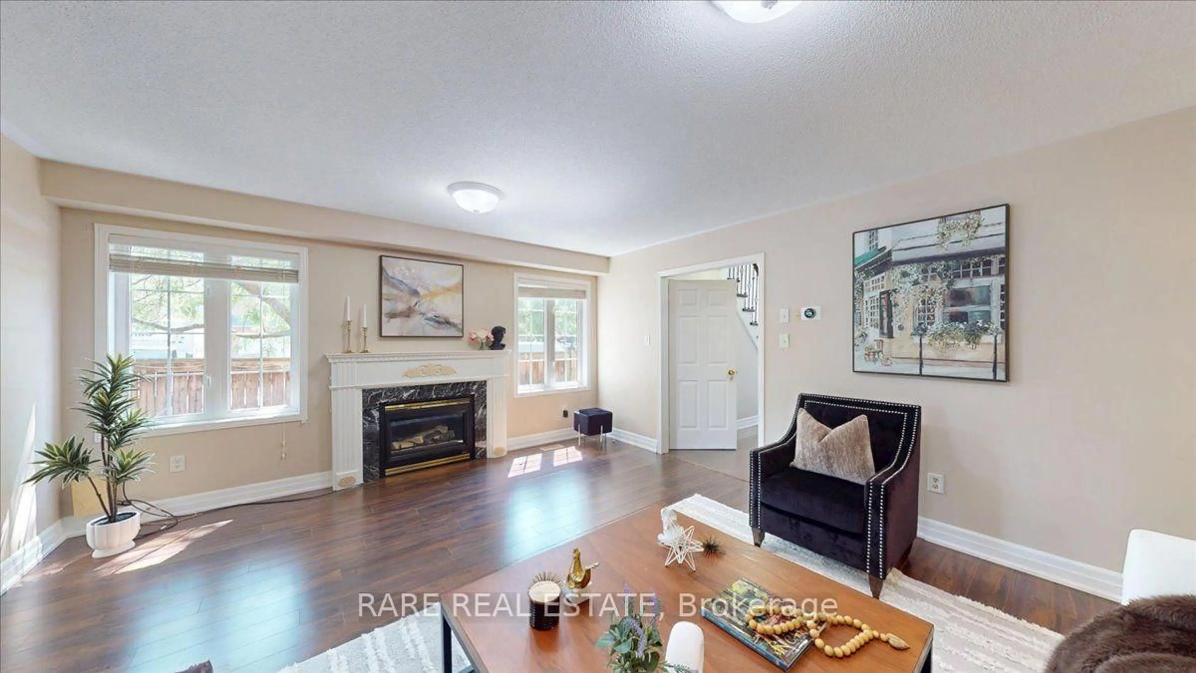Living room with furniture, wood/laminate floor for 1825 Hobson Dr, Burlington Ontario L7L 6P9