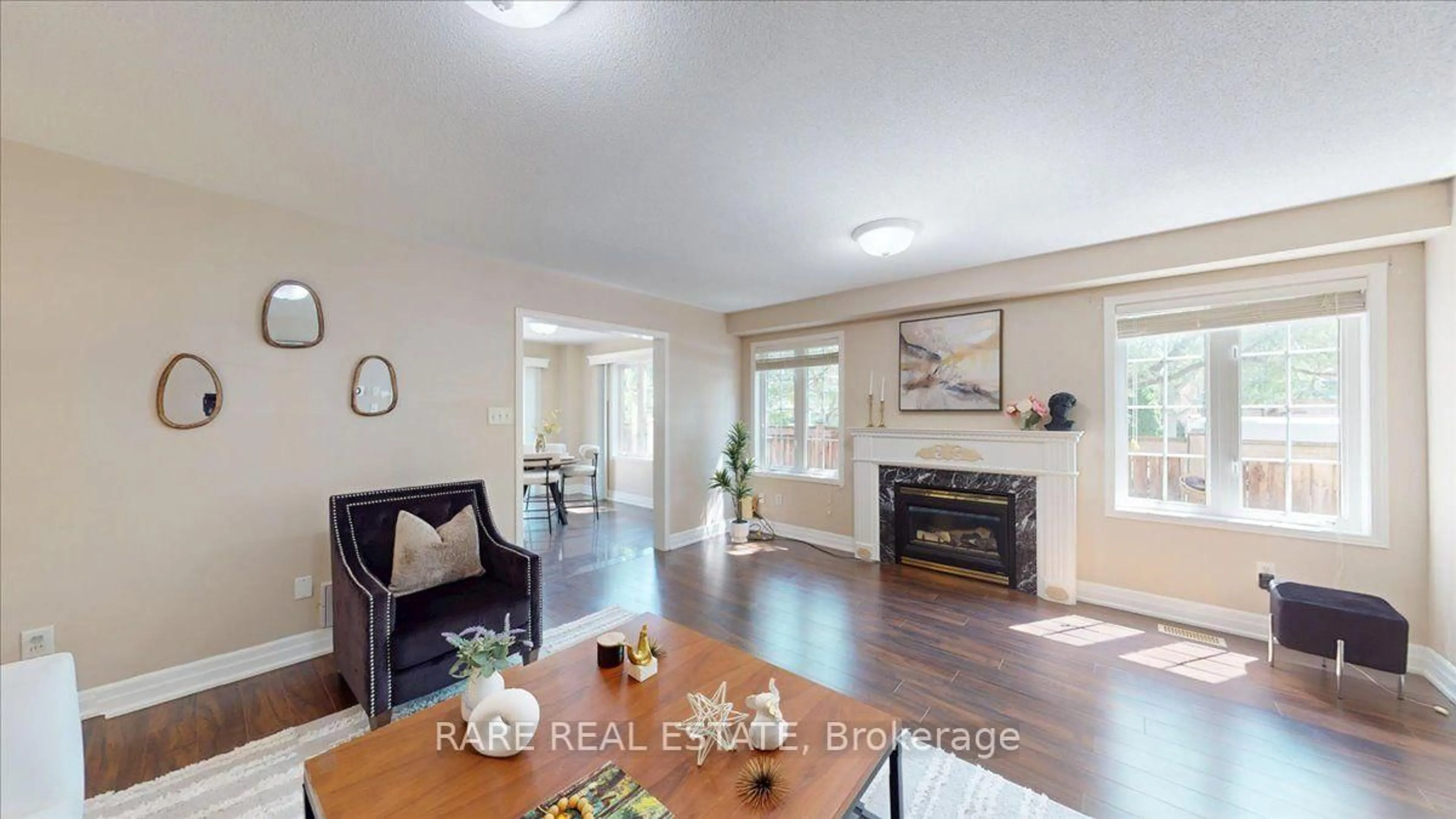 Living room with furniture, wood/laminate floor for 1825 Hobson Dr, Burlington Ontario L7L 6P9