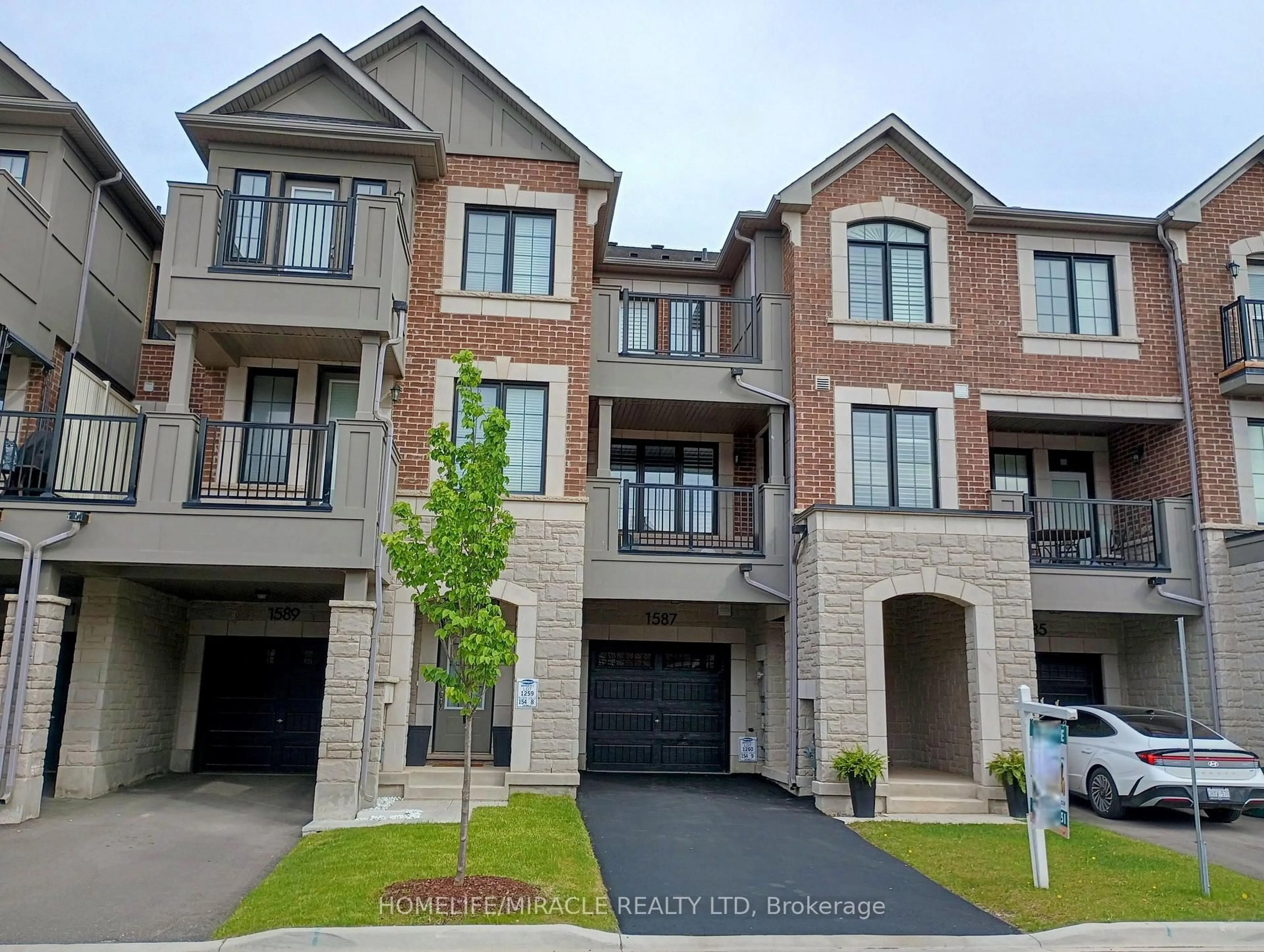 Home with brick exterior material, street for 1587 Moira Cres, Milton Ontario L9E 1X8