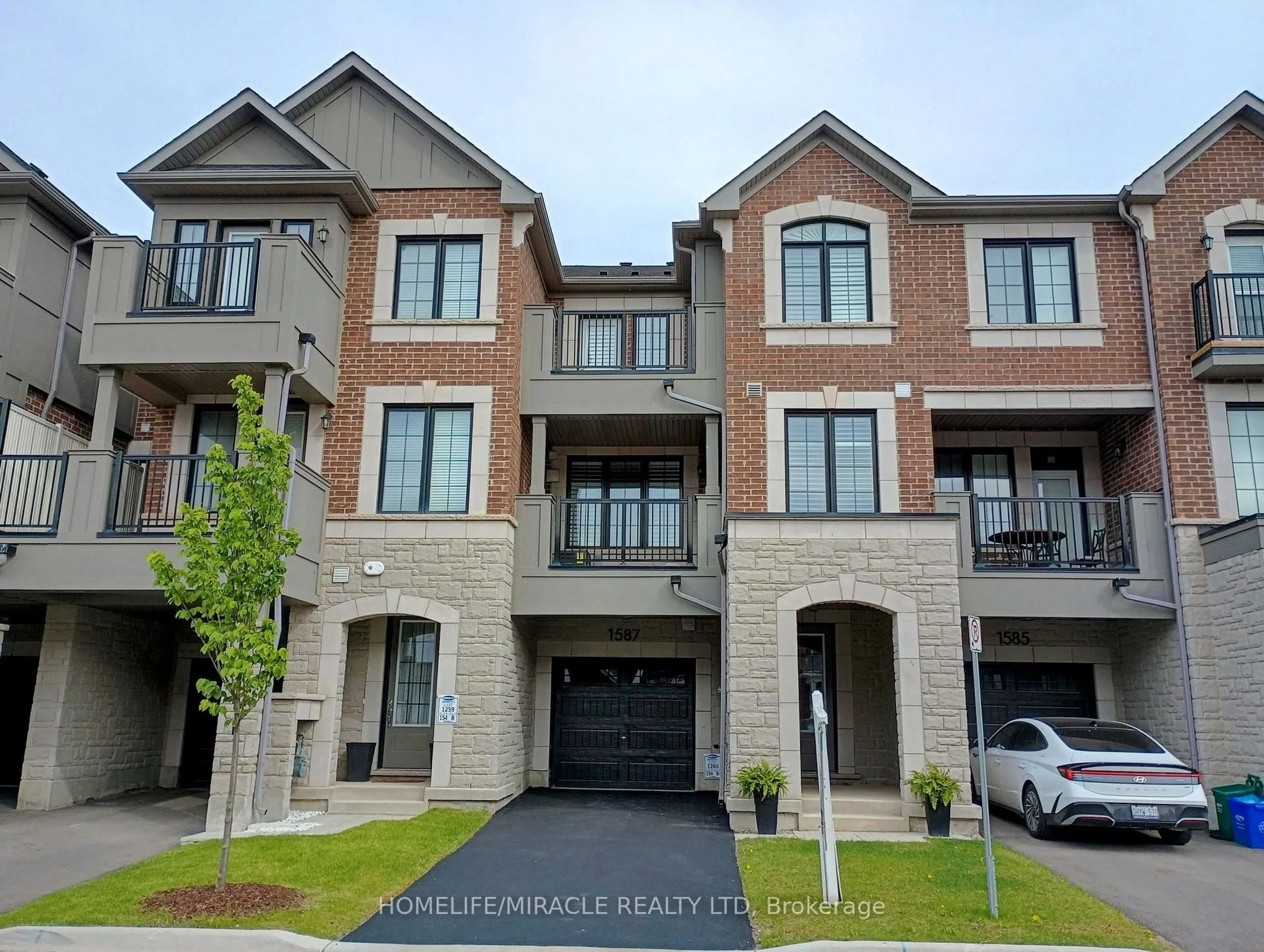 Home with brick exterior material, street for 1587 Moira Cres, Milton Ontario L9E 1X8
