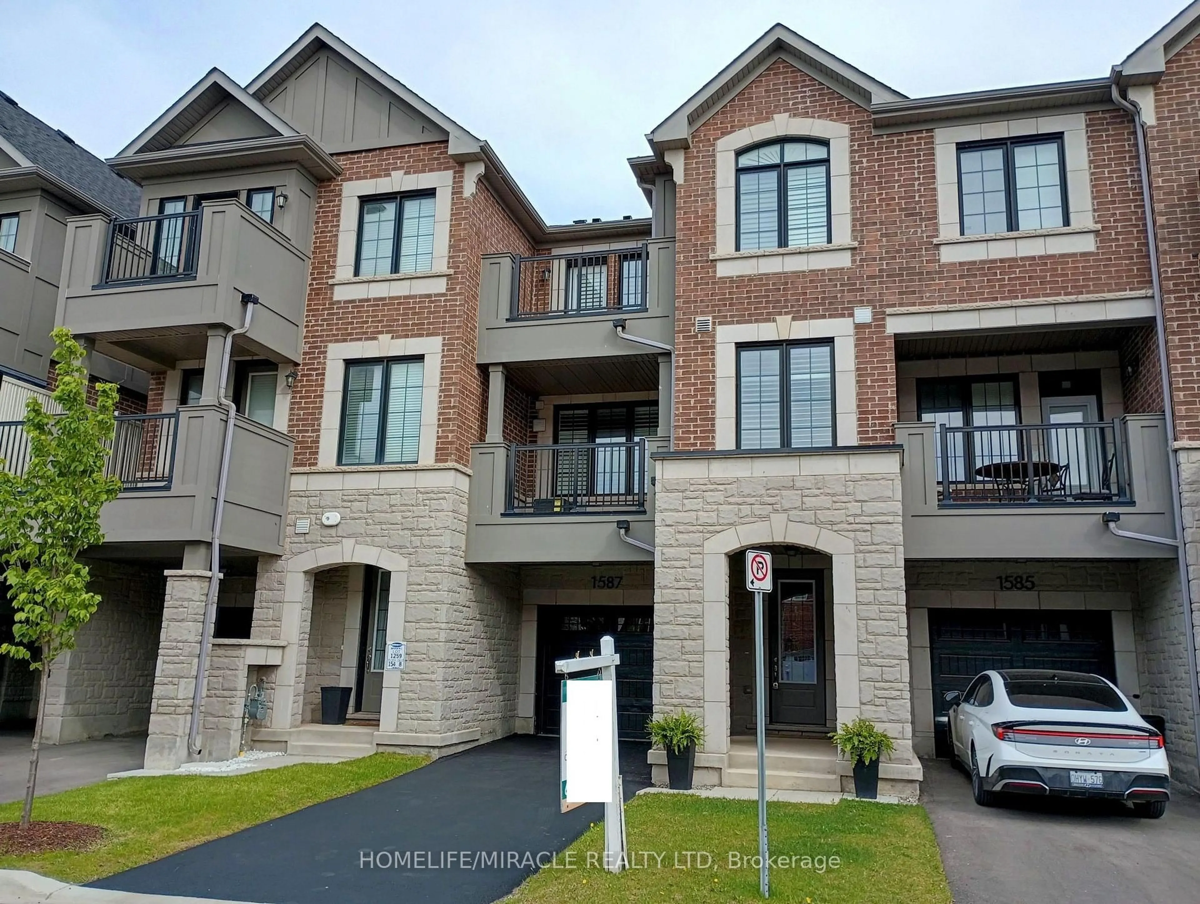 Home with brick exterior material, street for 1587 Moira Cres, Milton Ontario L9E 1X8