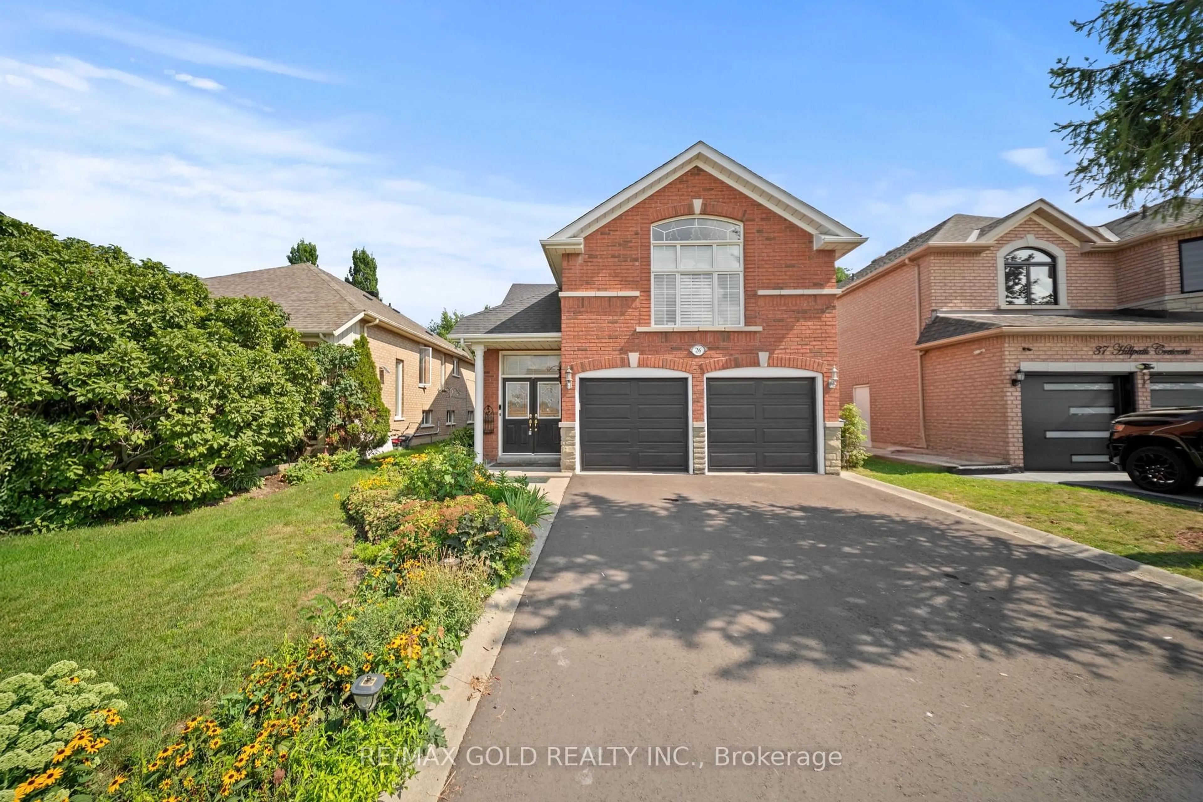 Home with brick exterior material, street for 26 Highwood Rd, Brampton Ontario L6Z 4T7