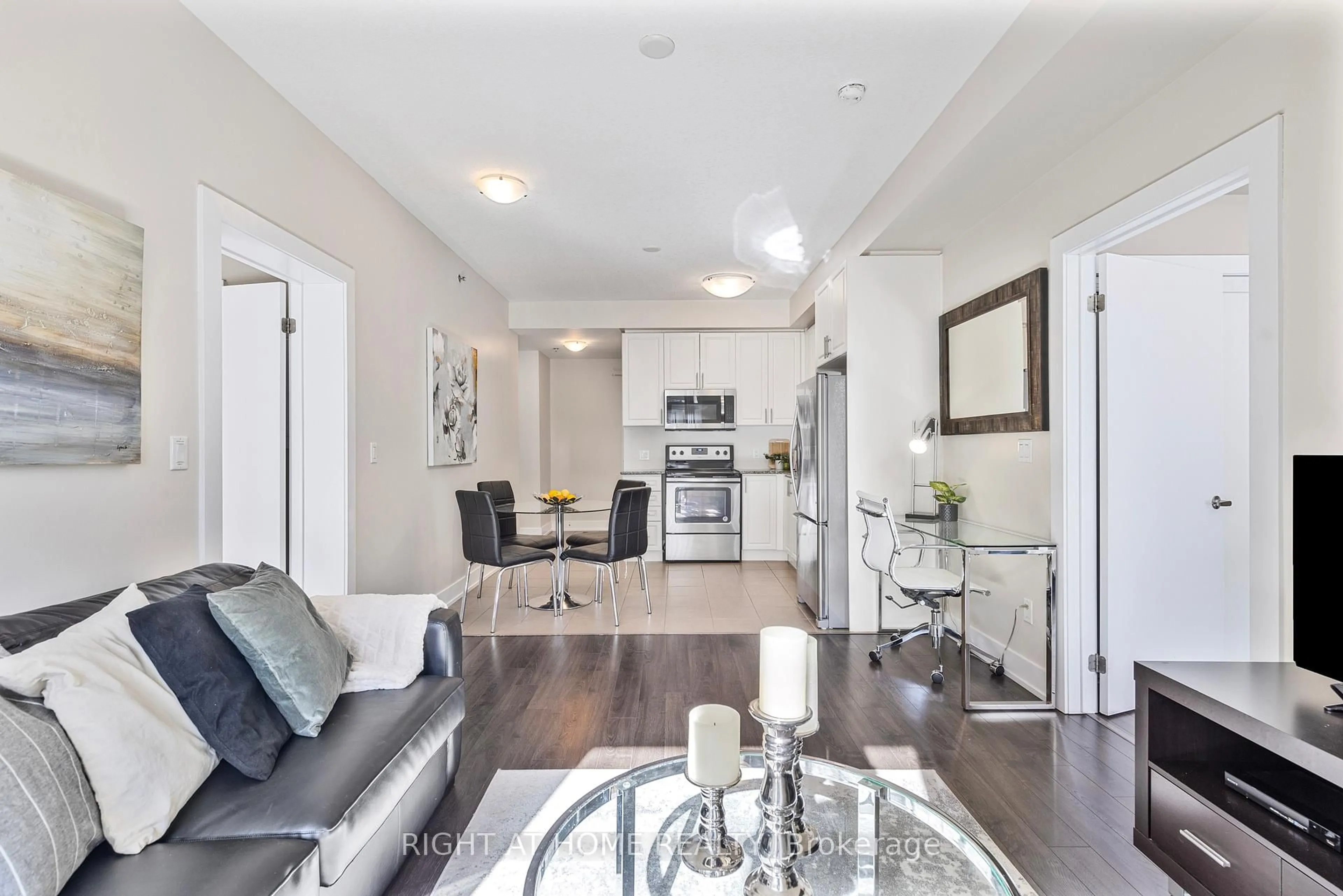Living room with furniture, unknown for 2486 Old Bronte Rd #423, Oakville Ontario L6M 4J2