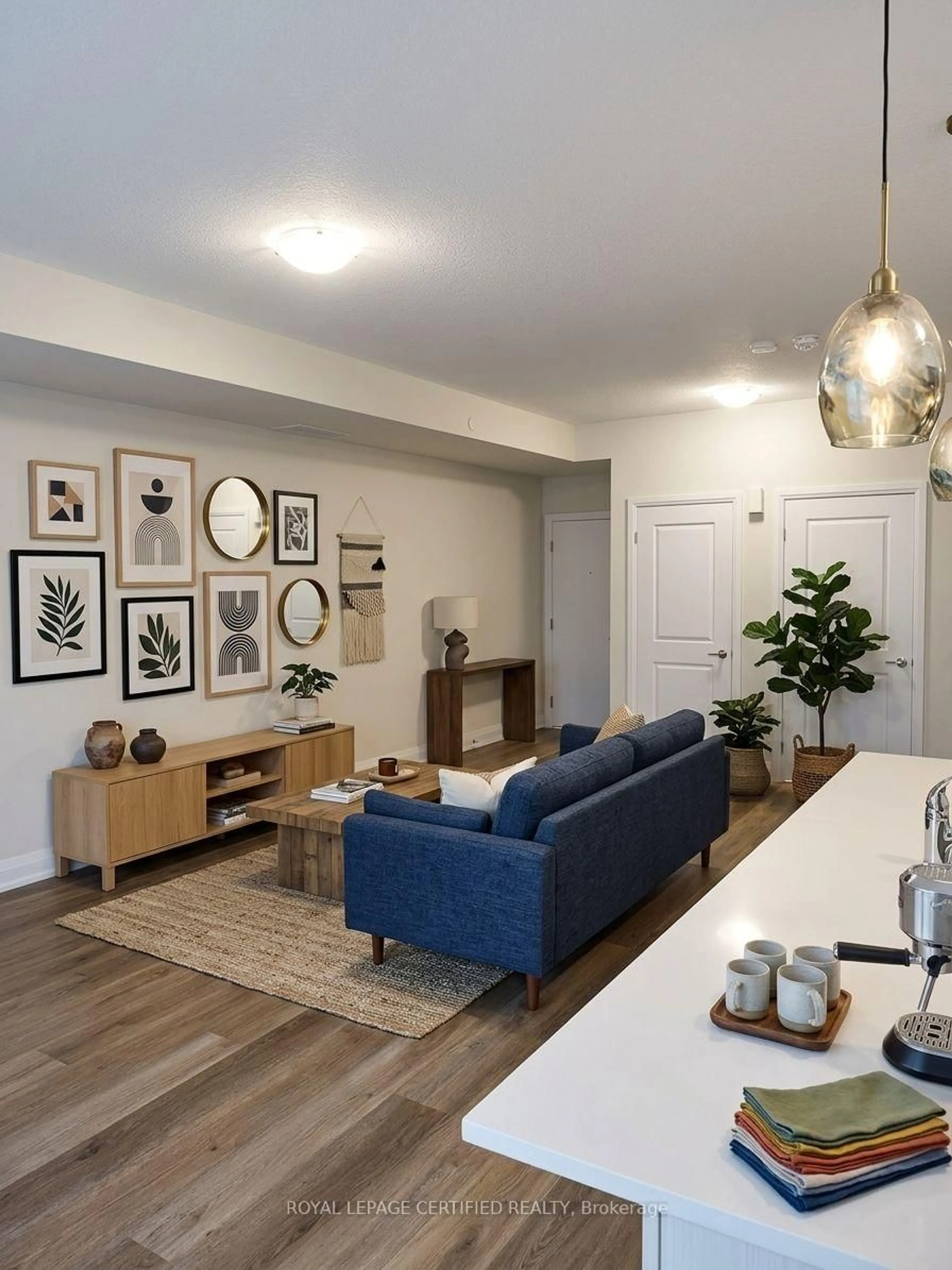 Living room with furniture, unknown for 1597 Rose Way #109, Milton Ontario L9E 1N5