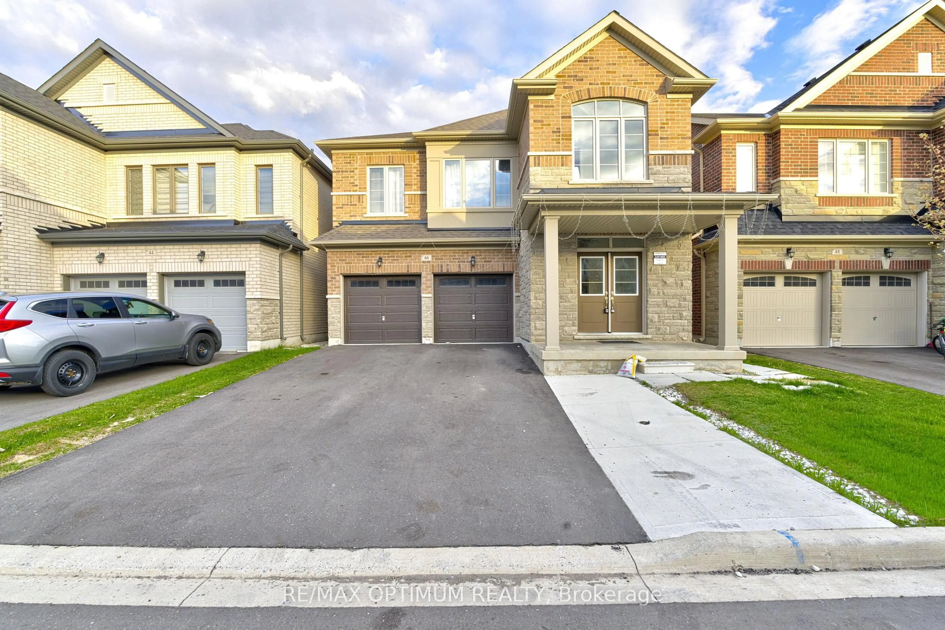 Home with brick exterior material, street for 46 Eastman Dr, Brampton Ontario L6X 5S5