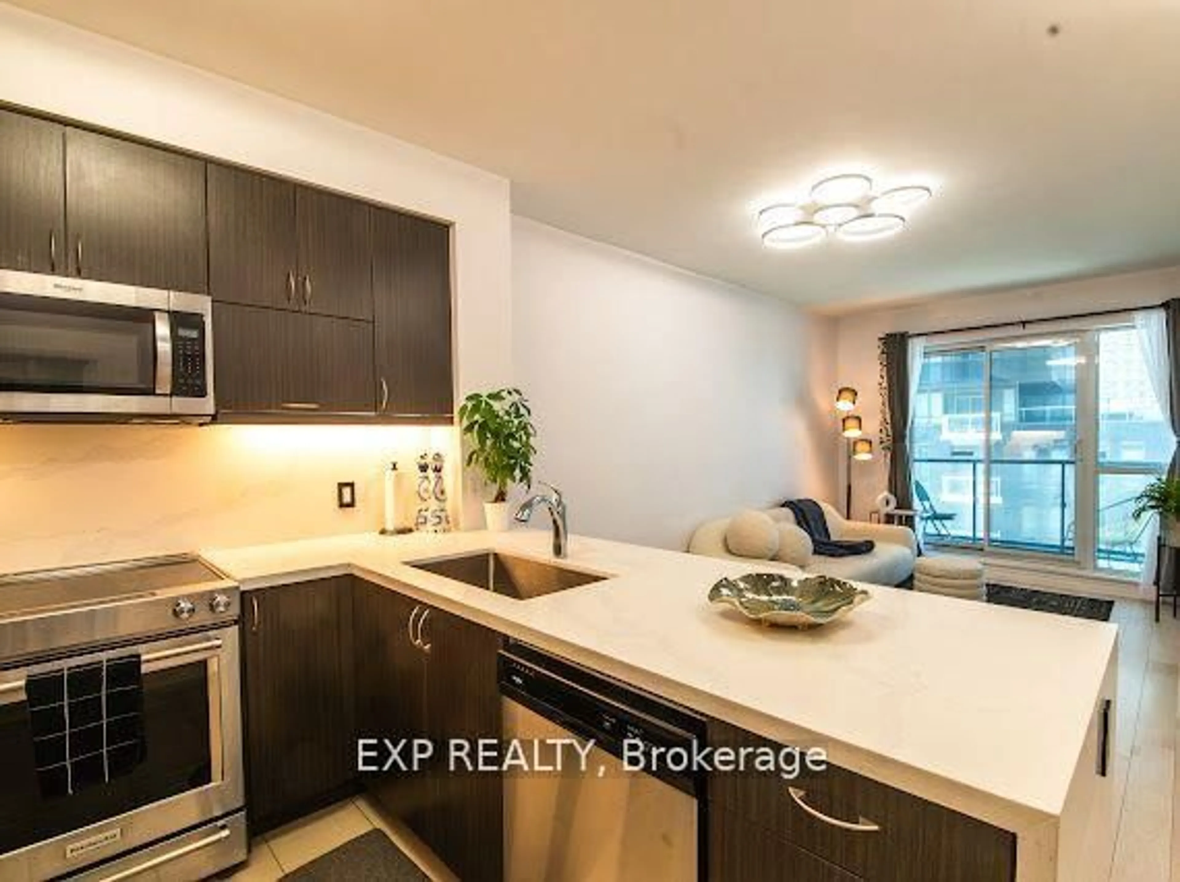 Open concept kitchen, unknown for 39 Annie Craig Dr #602, Toronto Ontario M8V 0H1