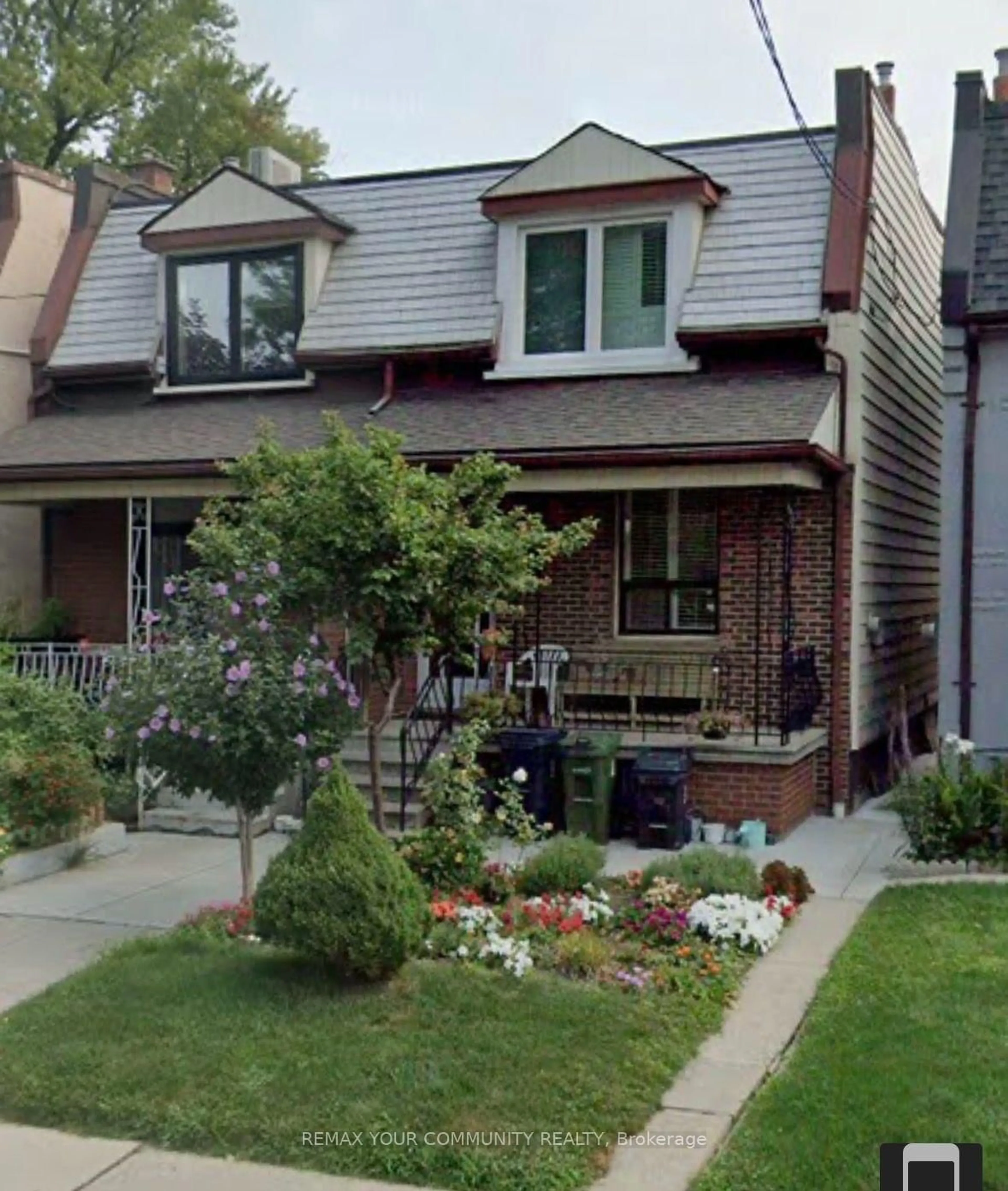 Home with brick exterior material, street for 105 Laughton Ave, Toronto Ontario M6N 2X1