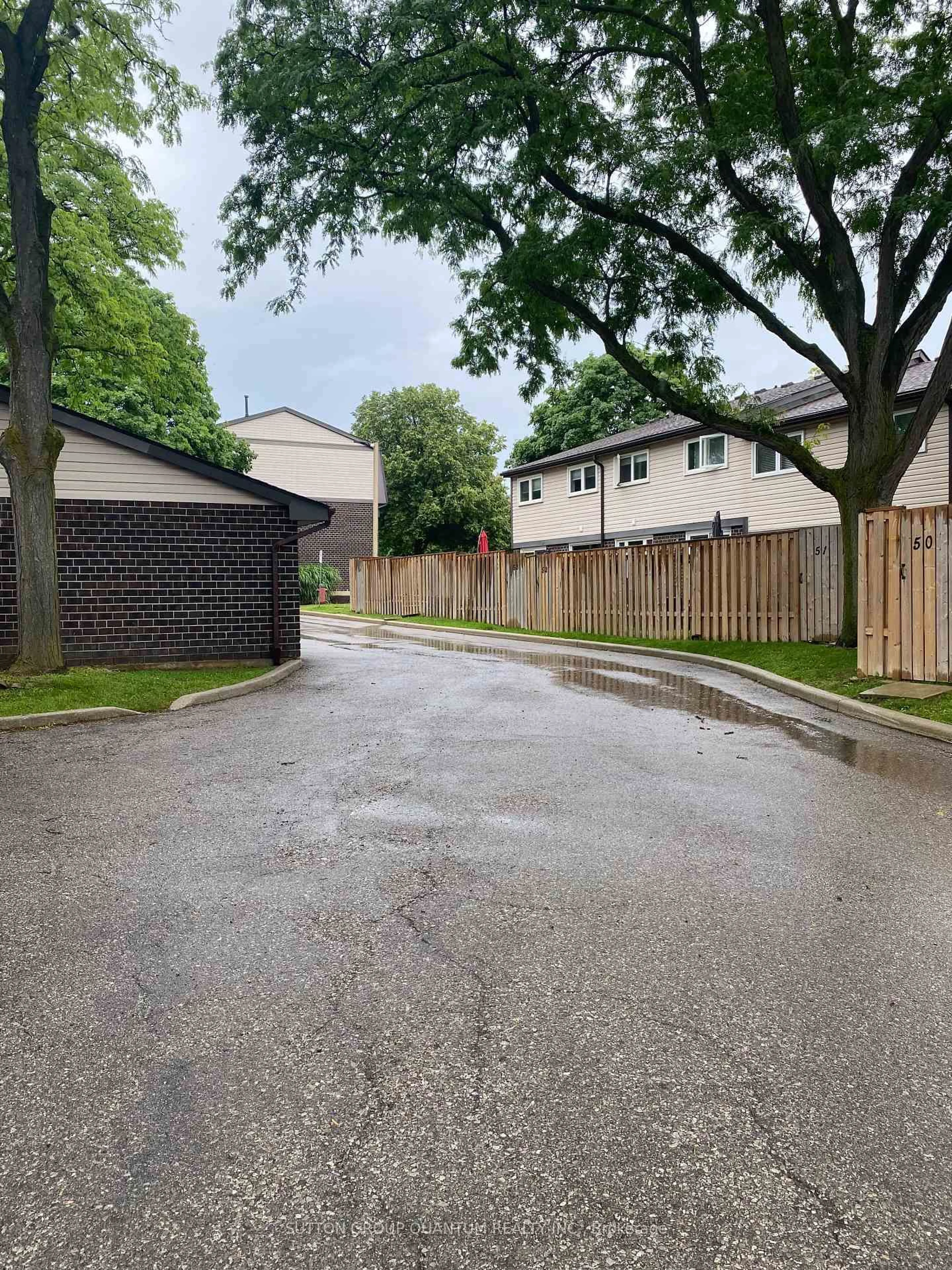 A pic from outside/outdoor area/front of a property/back of a property/a pic from drone, street for 318 LAURIER Ave #58, Milton Ontario L9T 3M9