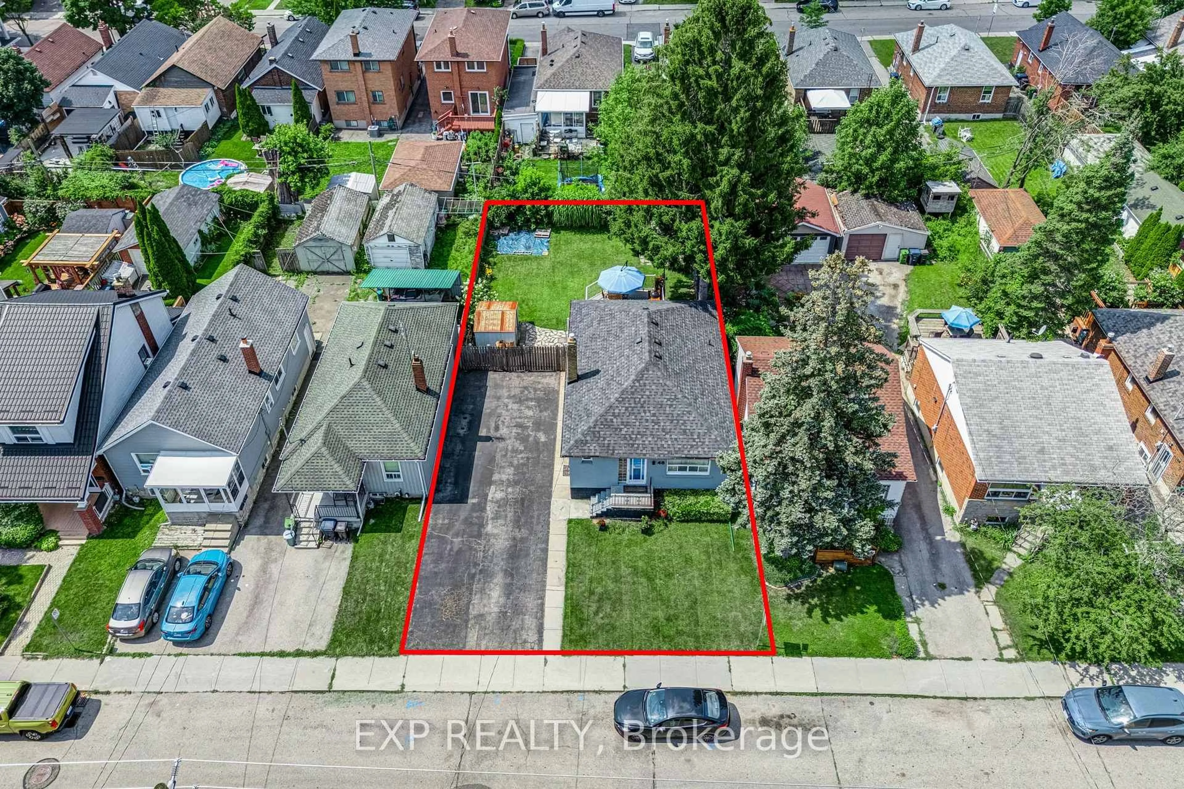A pic from outside/outdoor area/front of a property/back of a property/a pic from drone, street for 48 Sixteenth St, Toronto Ontario M8V 3J8