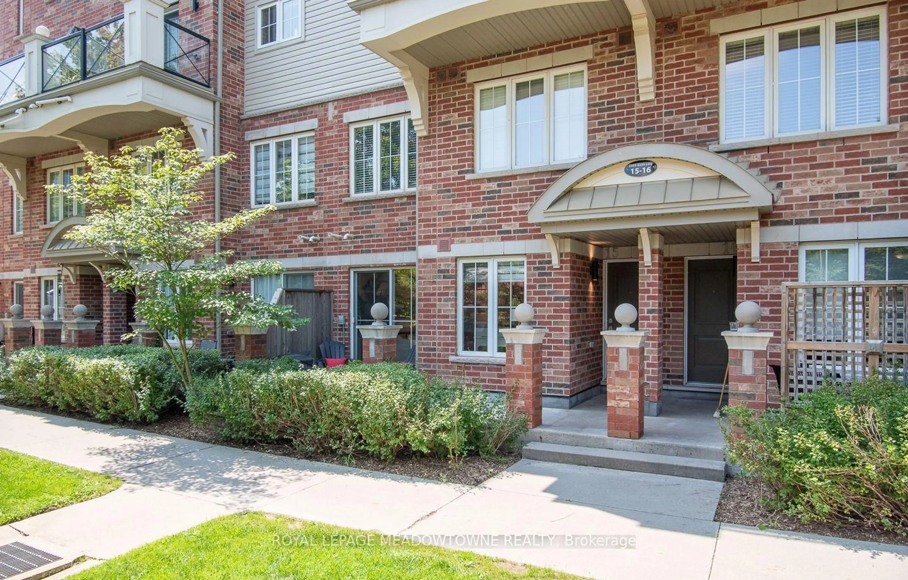 Home with brick exterior material, street for 2563 Sixth Line #15, Oakville Ontario L6H 0H7