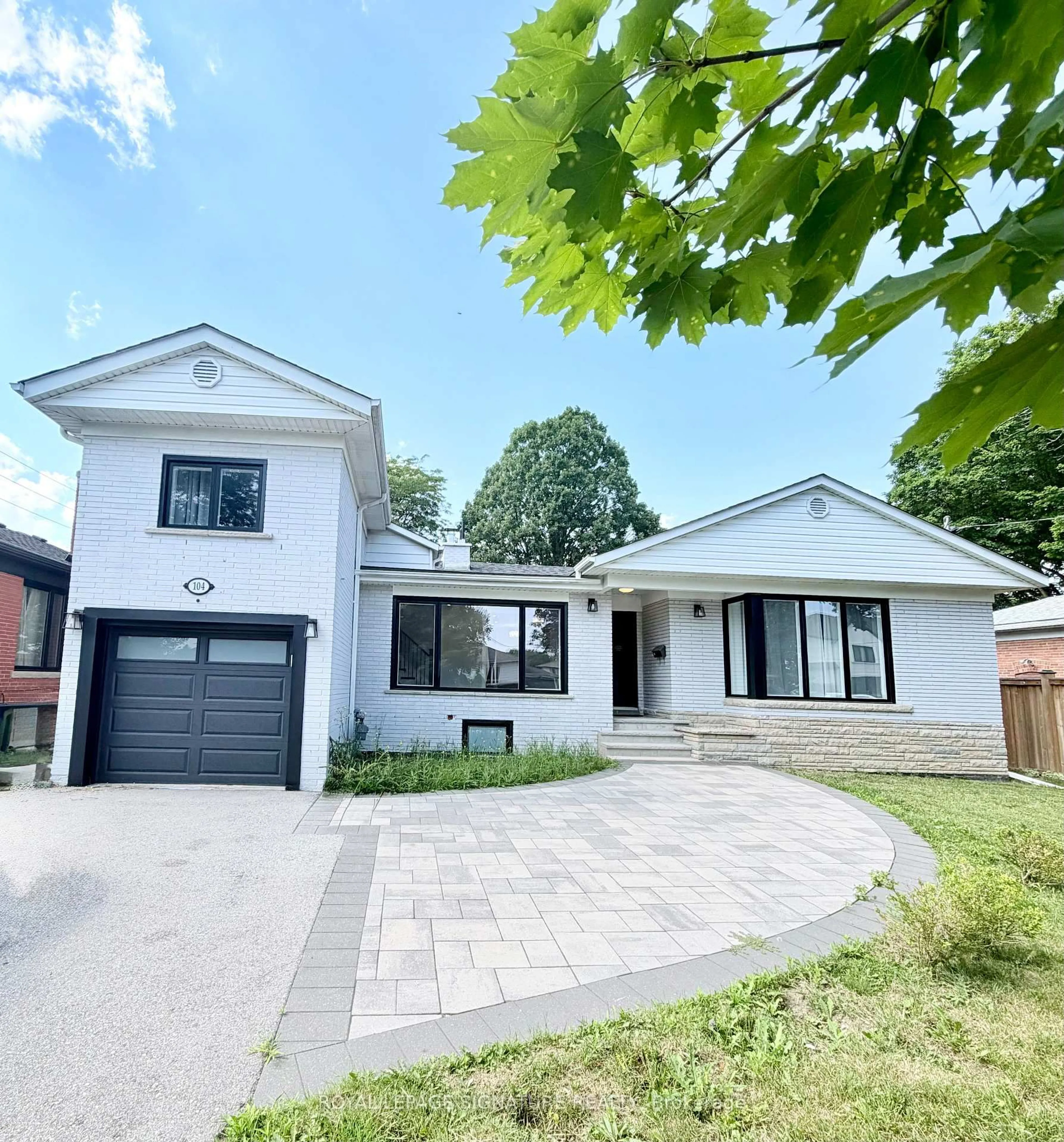 Home with brick exterior material, street for 104 Great Oak Dr, Toronto Ontario M9A 1N5