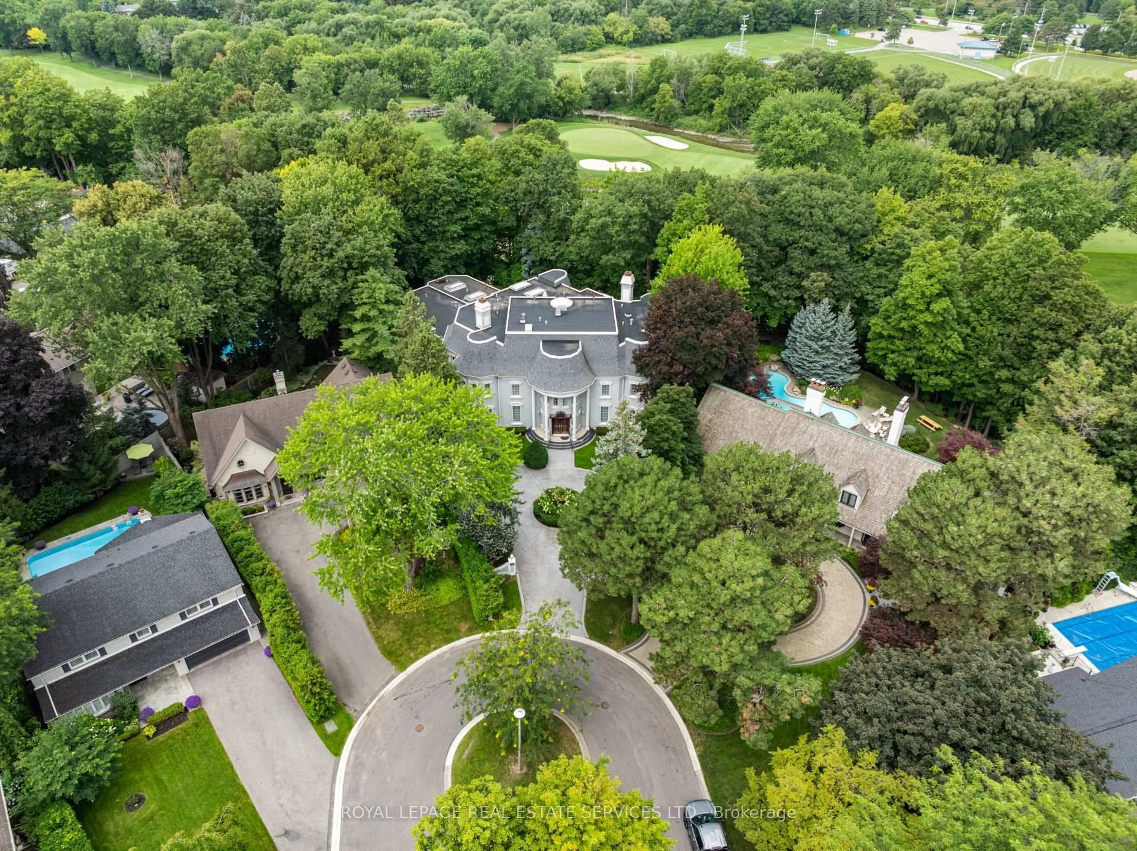 A pic from outside/outdoor area/front of a property/back of a property/a pic from drone, unknown for 7 The Green Pines, Toronto Ontario M9C 2K5