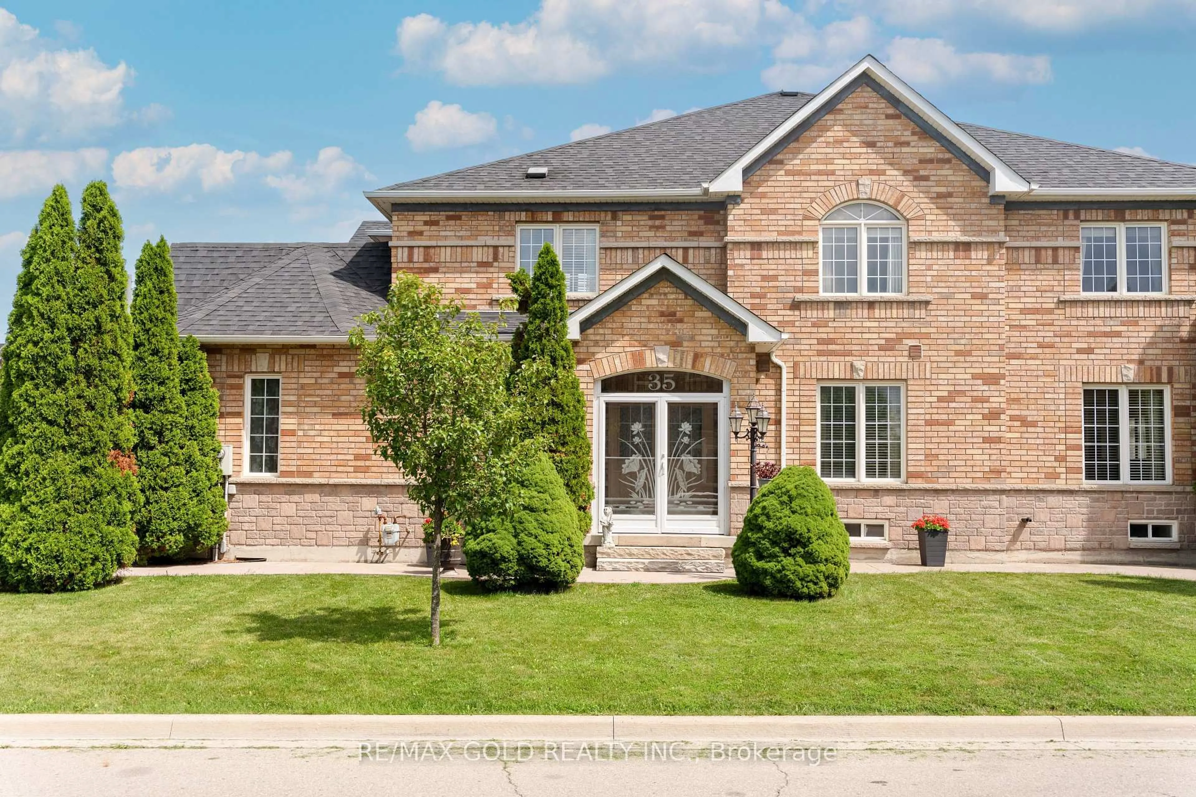 Home with brick exterior material, street for 35 Goreridge Cres, Brampton Ontario L6P 1P2