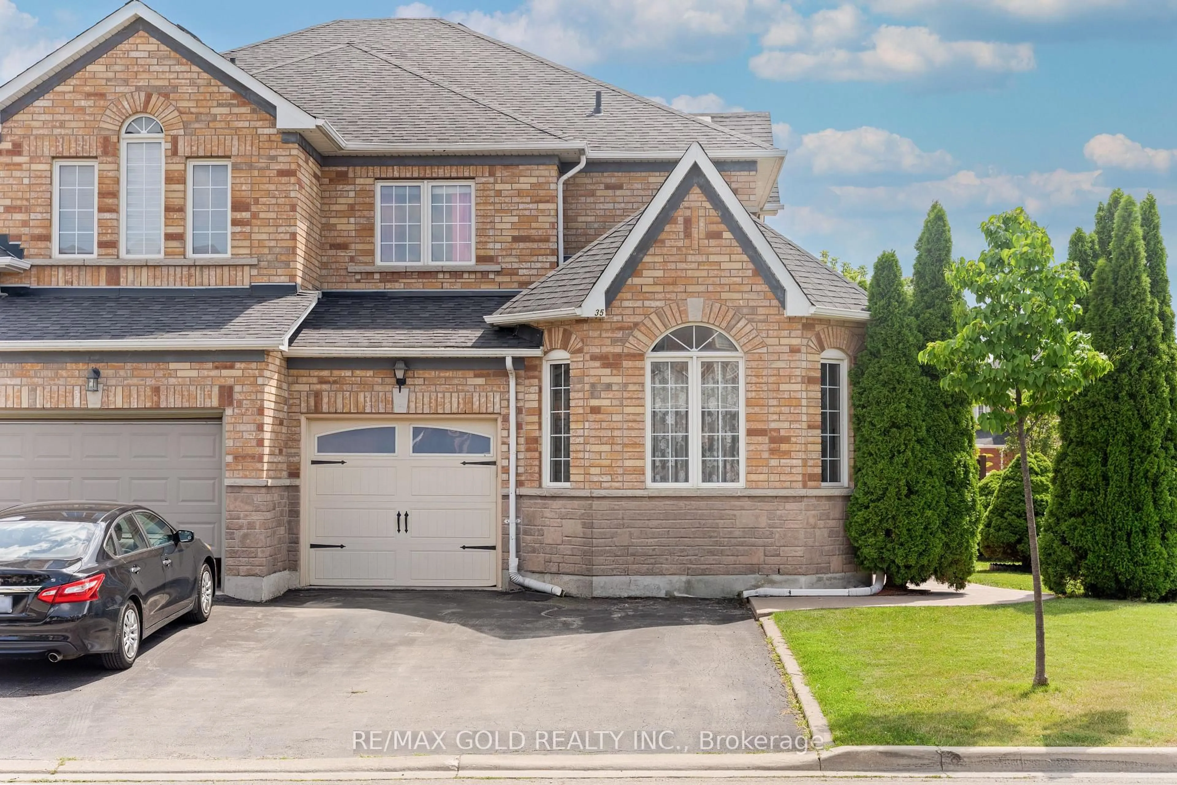 Home with brick exterior material, street for 35 Goreridge Cres, Brampton Ontario L6P 1P2