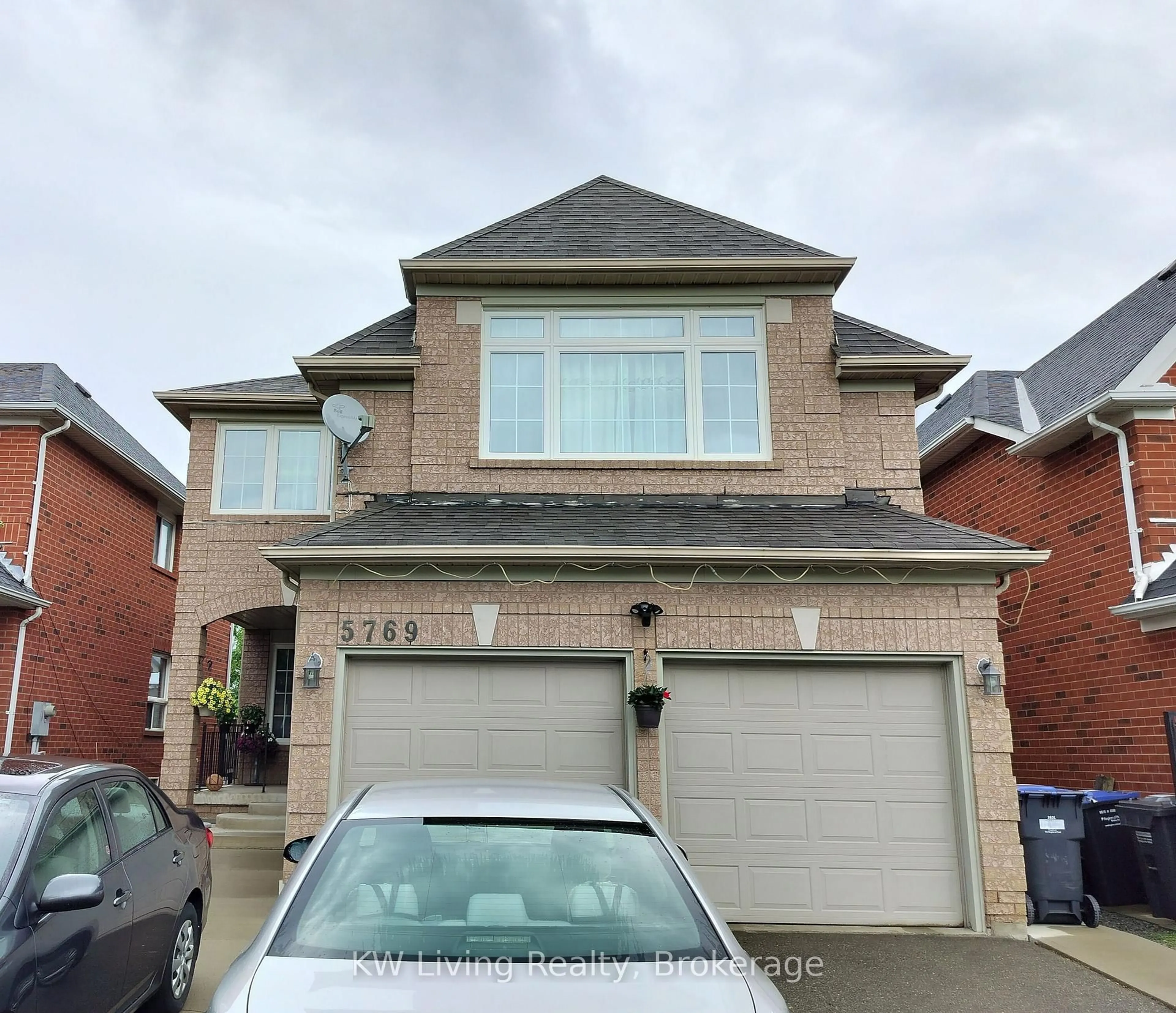 Home with brick exterior material, street for 5769 Greensboro Dr, Mississauga Ontario L5M 5V1