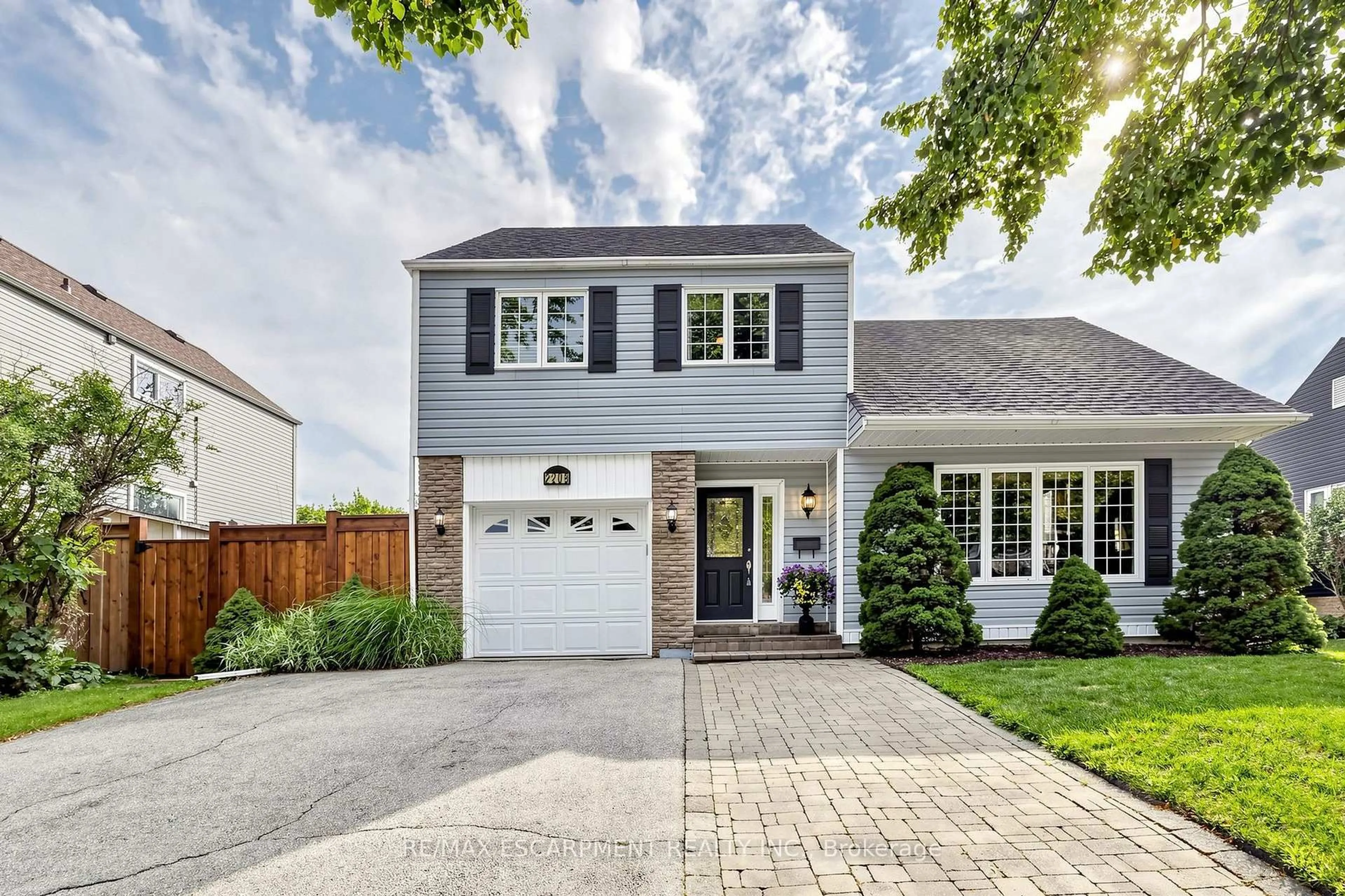Home with brick exterior material, street for 2208 Lancaster Cres, Burlington Ontario L7P 3G5