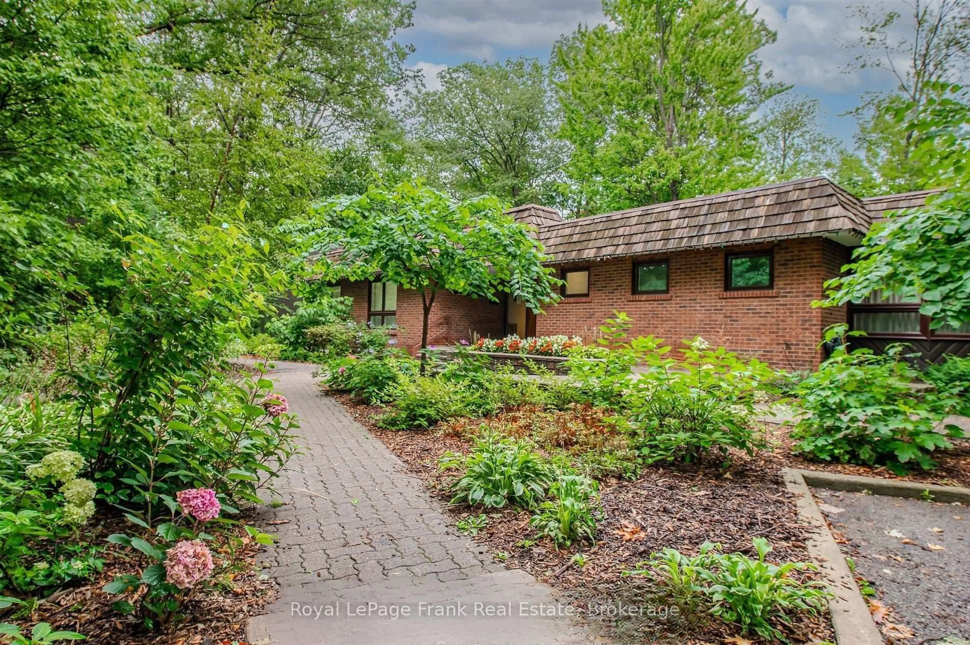A pic from outside/outdoor area/front of a property/back of a property/a pic from drone, street for 1110 Walden Circ #102, Mississauga Ontario L5J 4R3