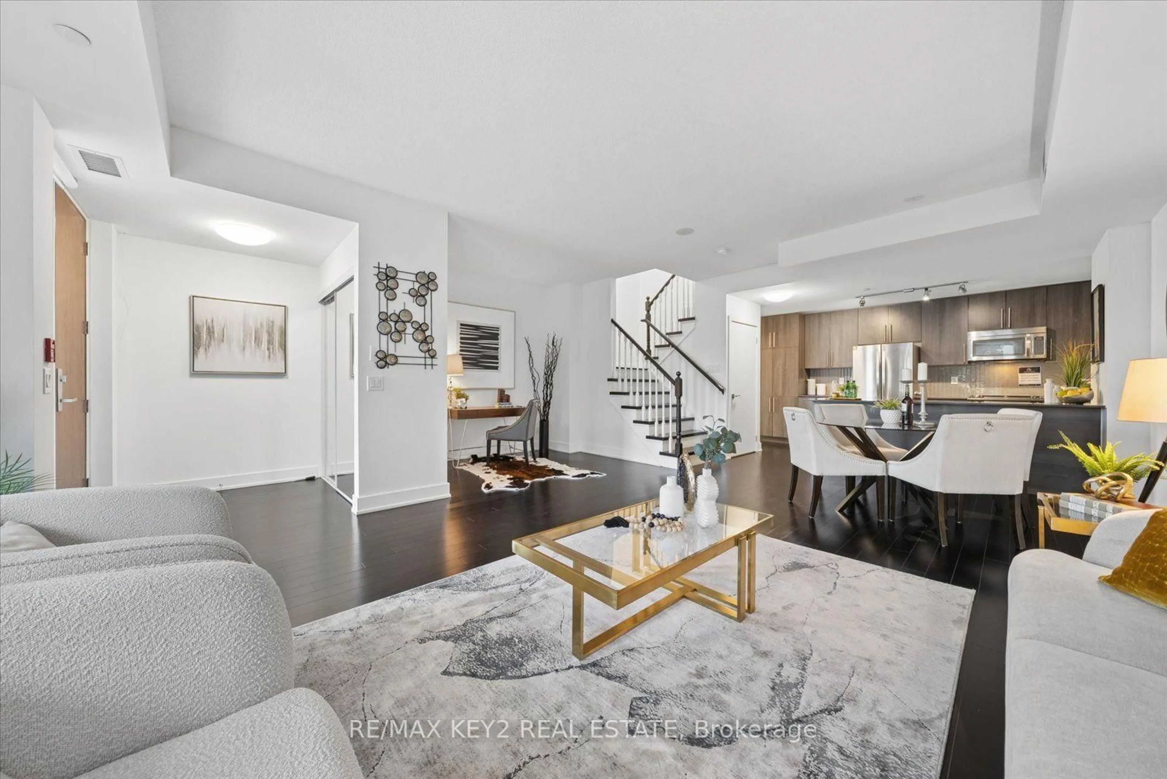 Living room with furniture, unknown for 4011 Brickstone Mews #TH6, Mississauga Ontario L5B 0G3