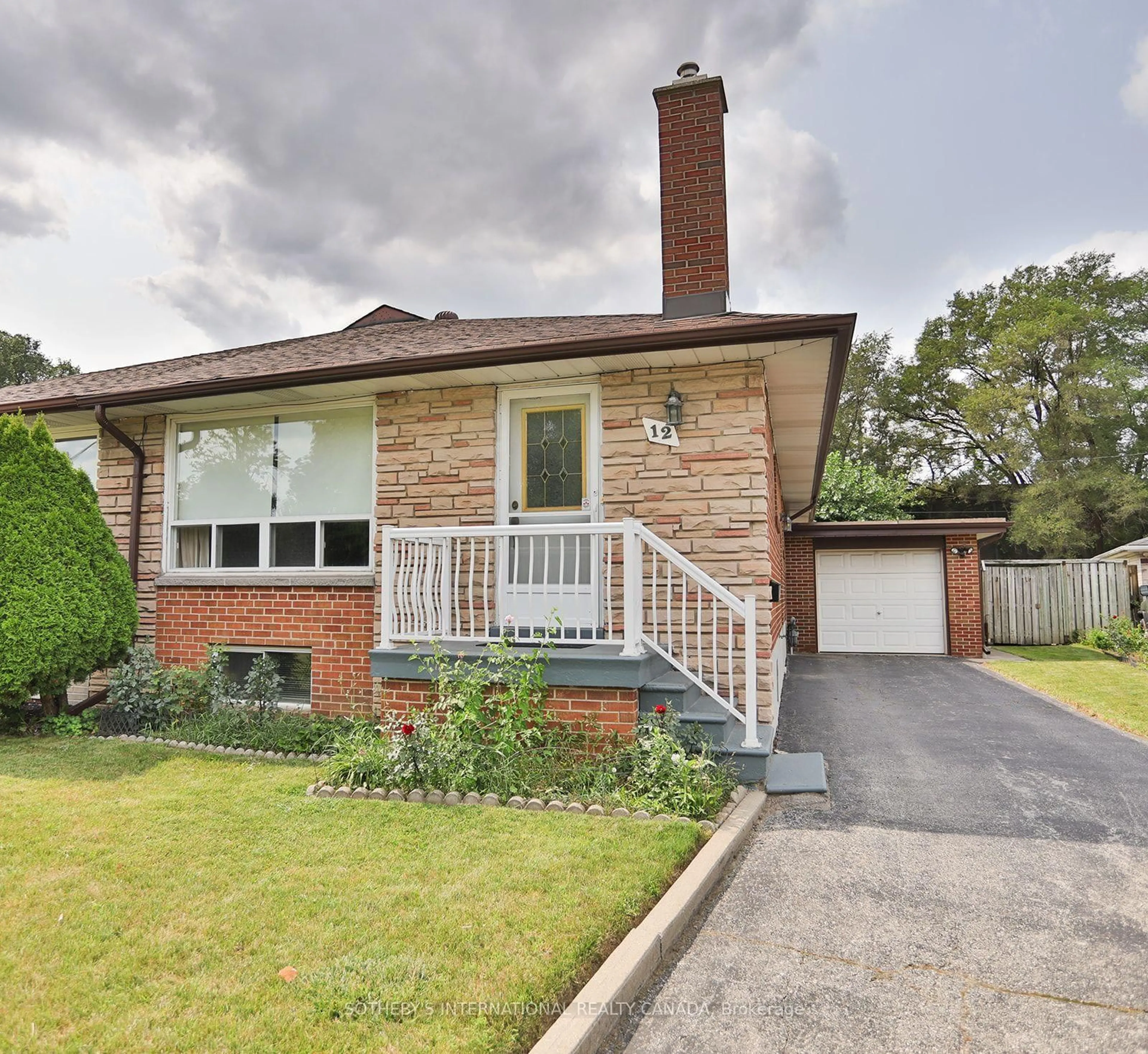 Home with brick exterior material, street for 12 Waterbury Dr, Toronto Ontario M9R 3X6
