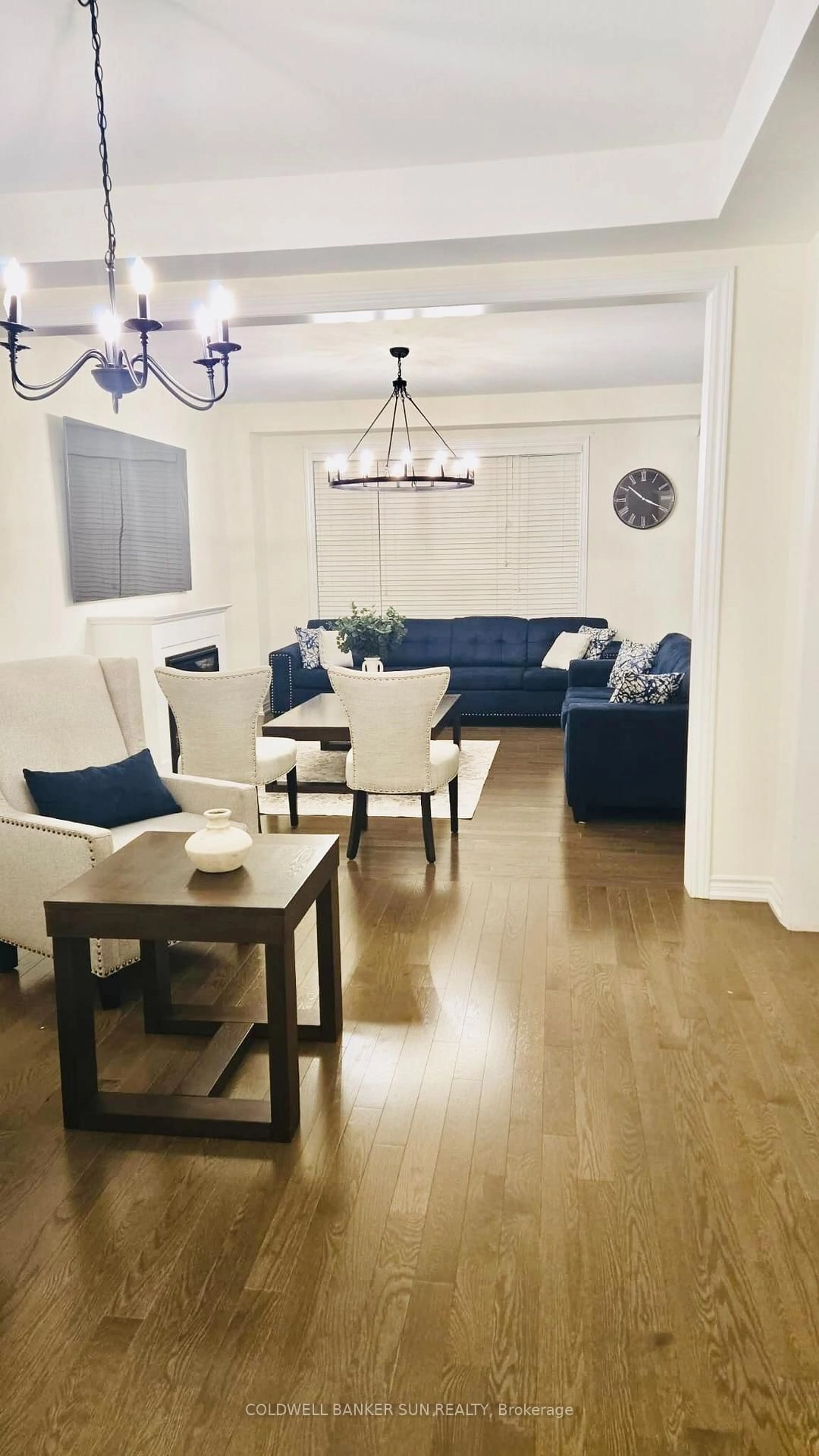 Living room with furniture, wood/laminate floor for 36 Bavenden Cres, Brampton Ontario L6X 5S3
