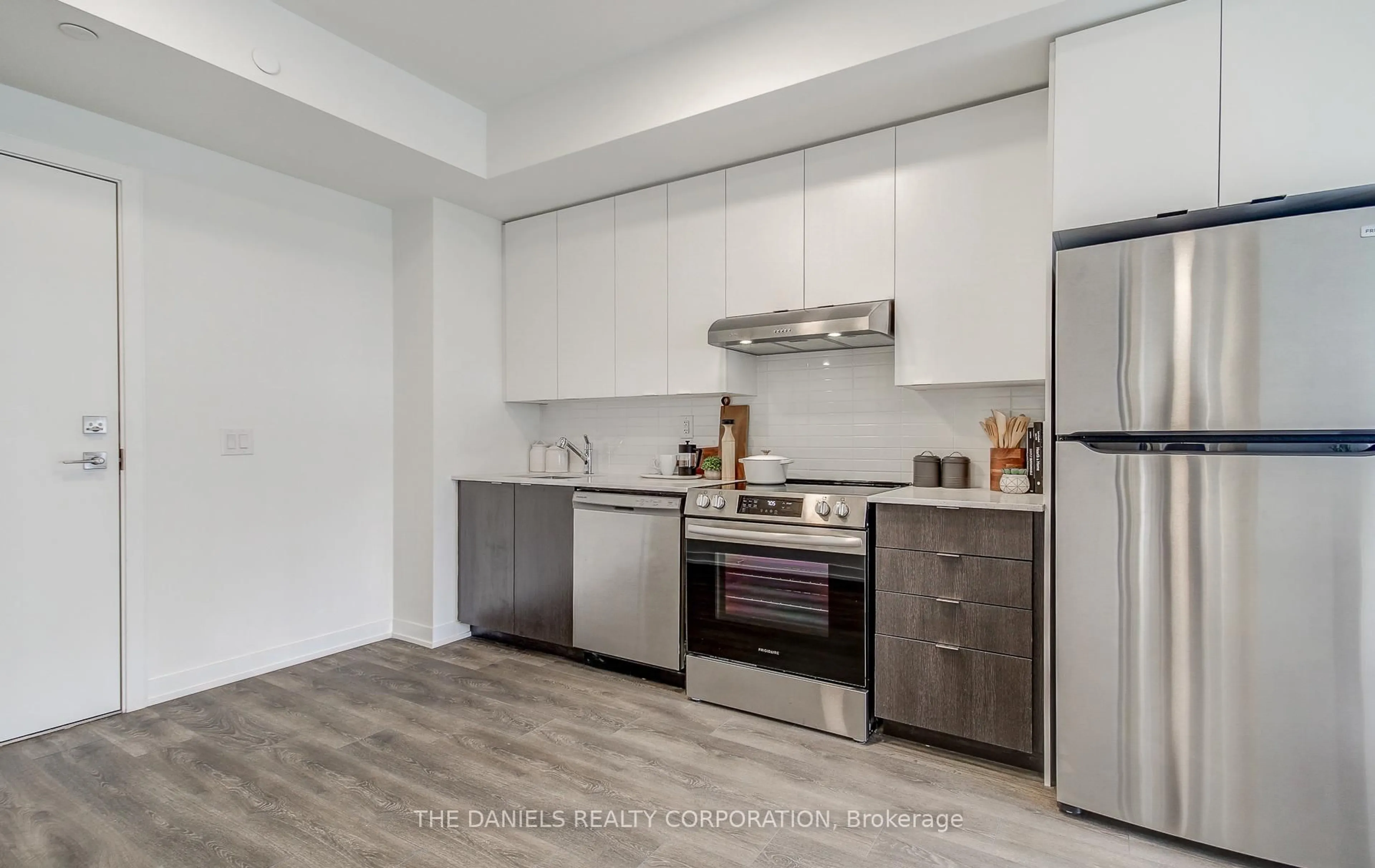 Open concept kitchen, unknown for 165 Canon Jackson Dr #211, Toronto Ontario M6M 0C4