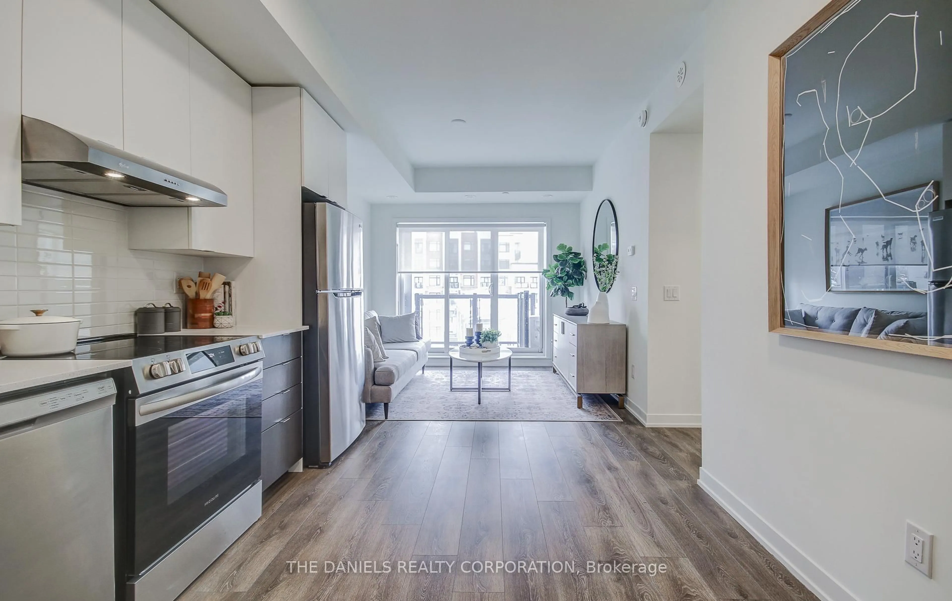 Open concept kitchen, unknown for 165 Canon Jackson Dr #211, Toronto Ontario M6M 0C4