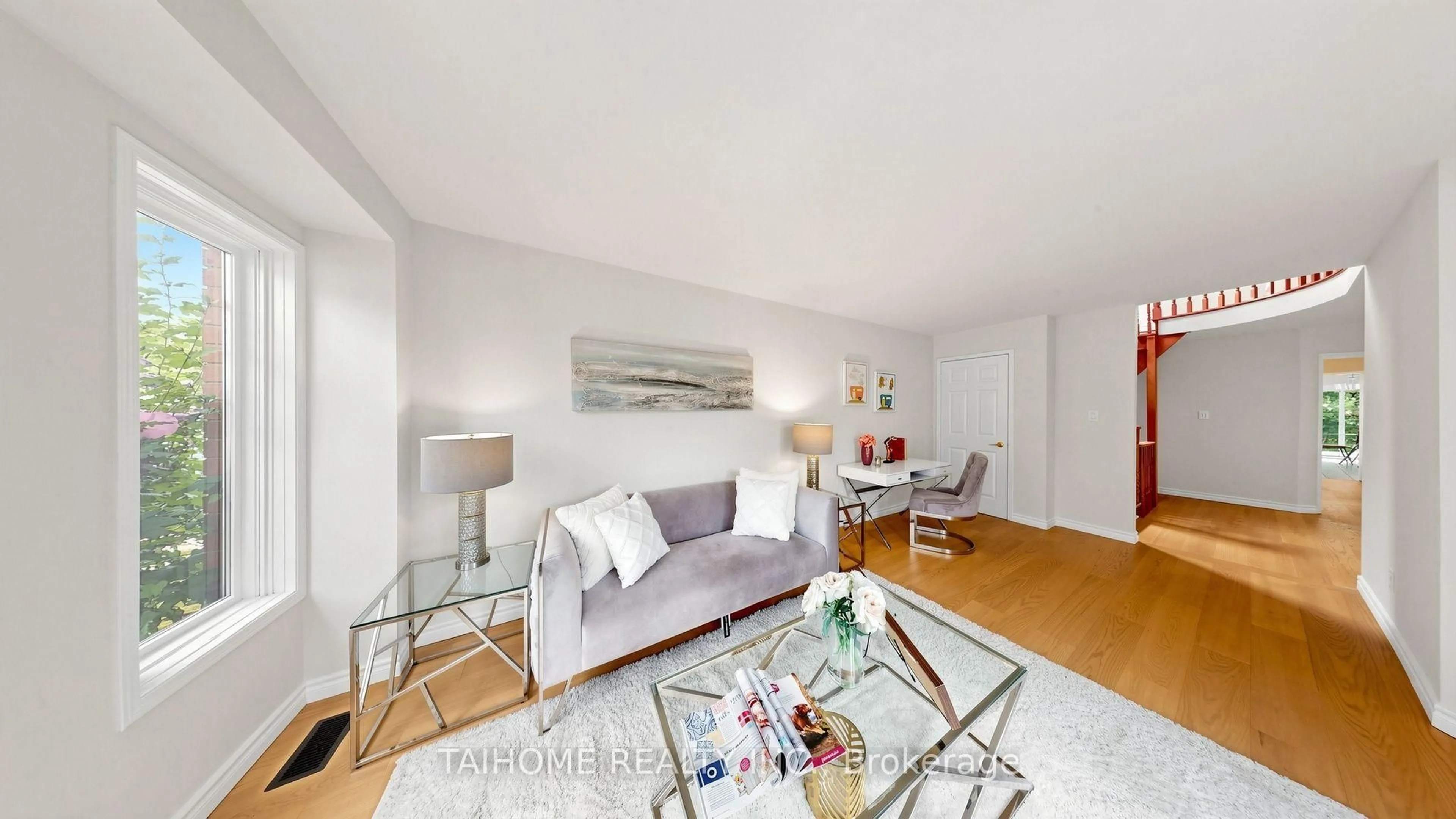 Living room with furniture, wood/laminate floor for 3573 Colonial Dr, Mississauga Ontario L5L 5M2